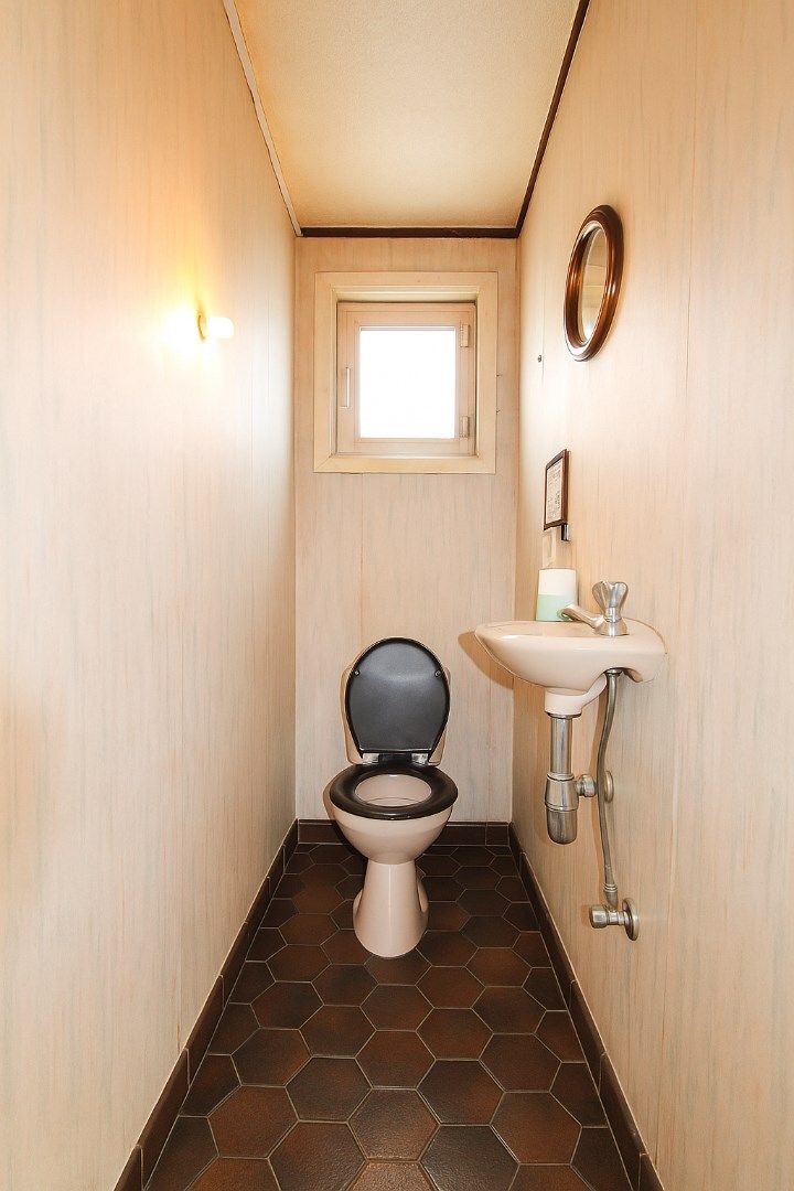 Te koop: Ruime en charmante halfopen bebouwing met uitgestrekte tuin, optie tot vijf slaapkamers en veel renovatiepotentieel in het centrum van Sint-Niklaas foto 9