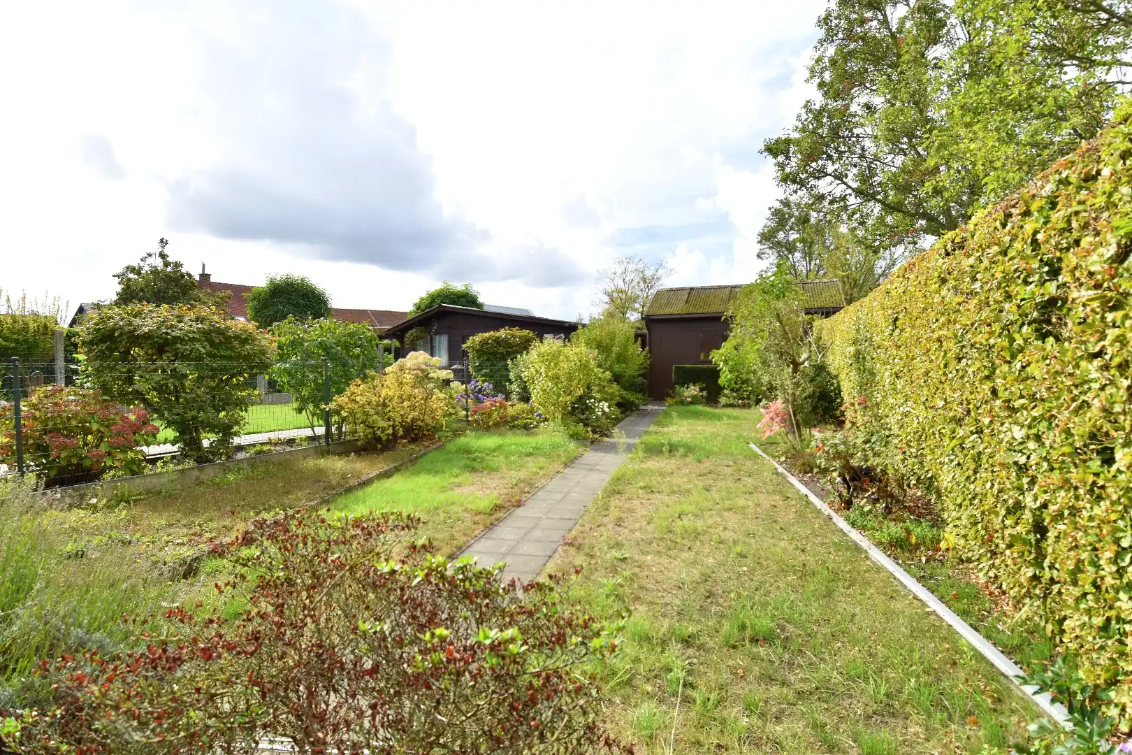 Woning op hoekperceel met 3 slaapkamers, garage en zalige tuin te koop in Gullegem foto 13