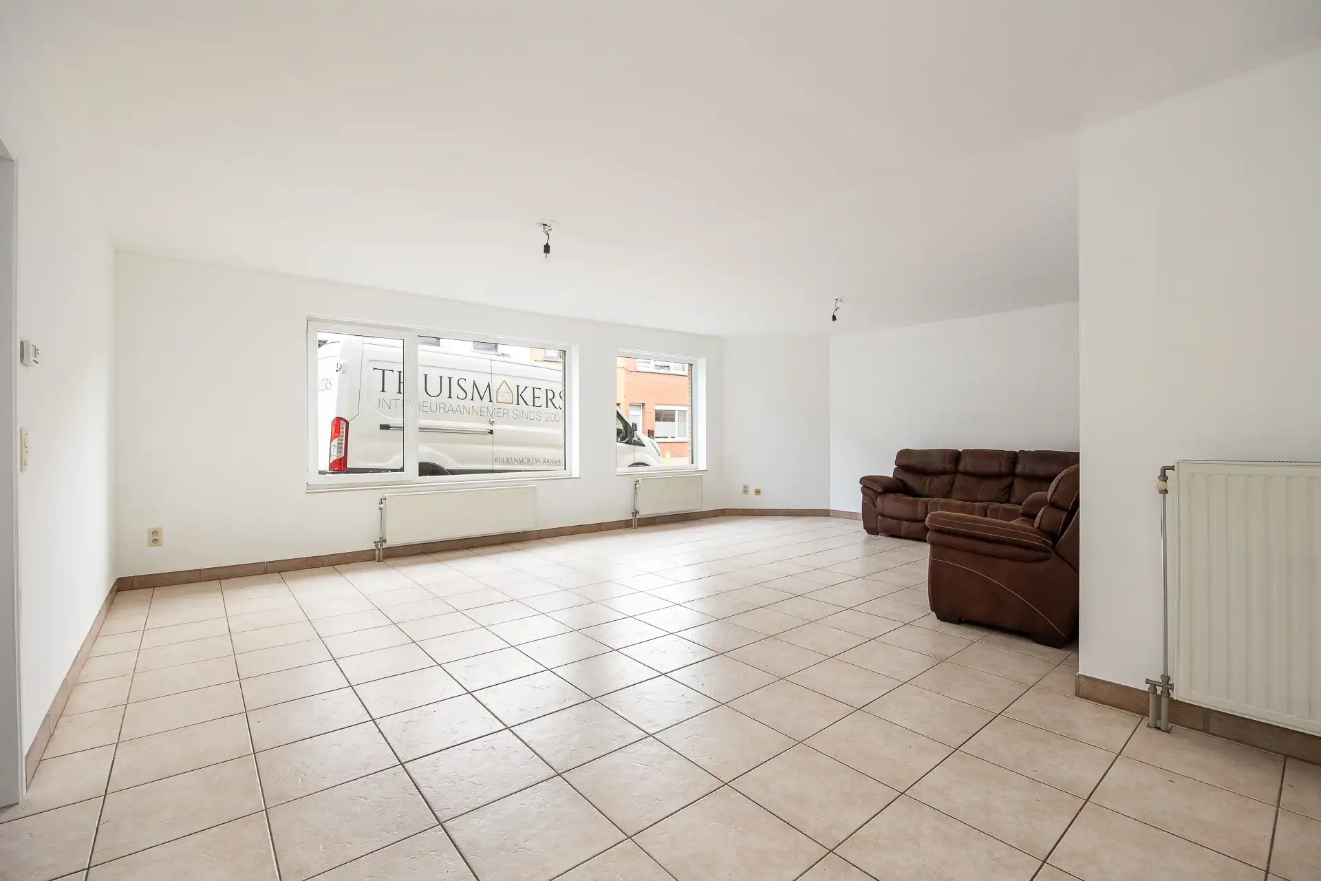 Gelijkvloers appartement met garage en tuin in Hemiksem foto 4