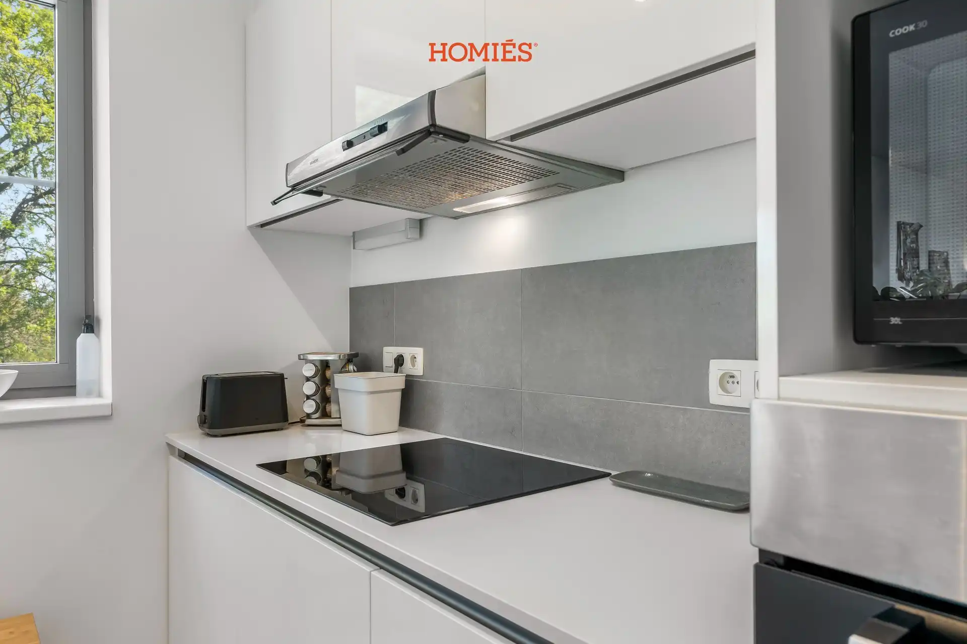 Modern 1-slaapkamerappartement met terras en staanplaats foto 16