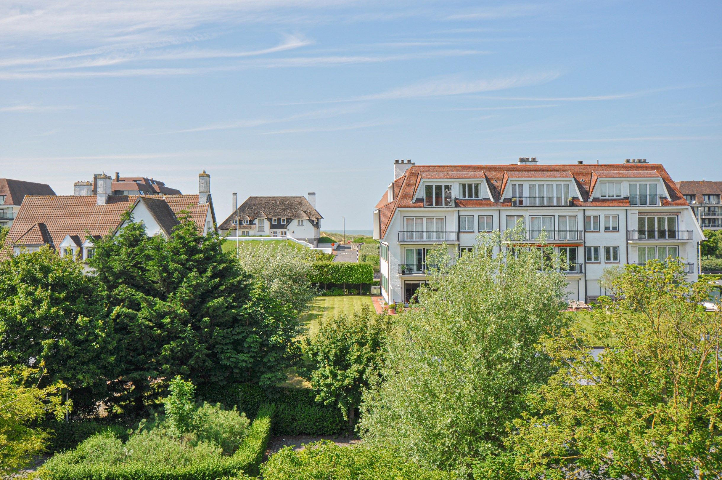 Subliem hoekappartement met ruime terrassen gelegen in het prestigieuze domein Tennis Garden. foto 13