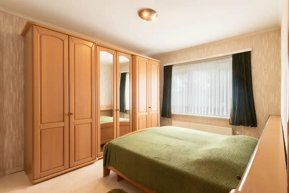 Halfopen gezinswoning met grote tuin in groene omgeving foto 8