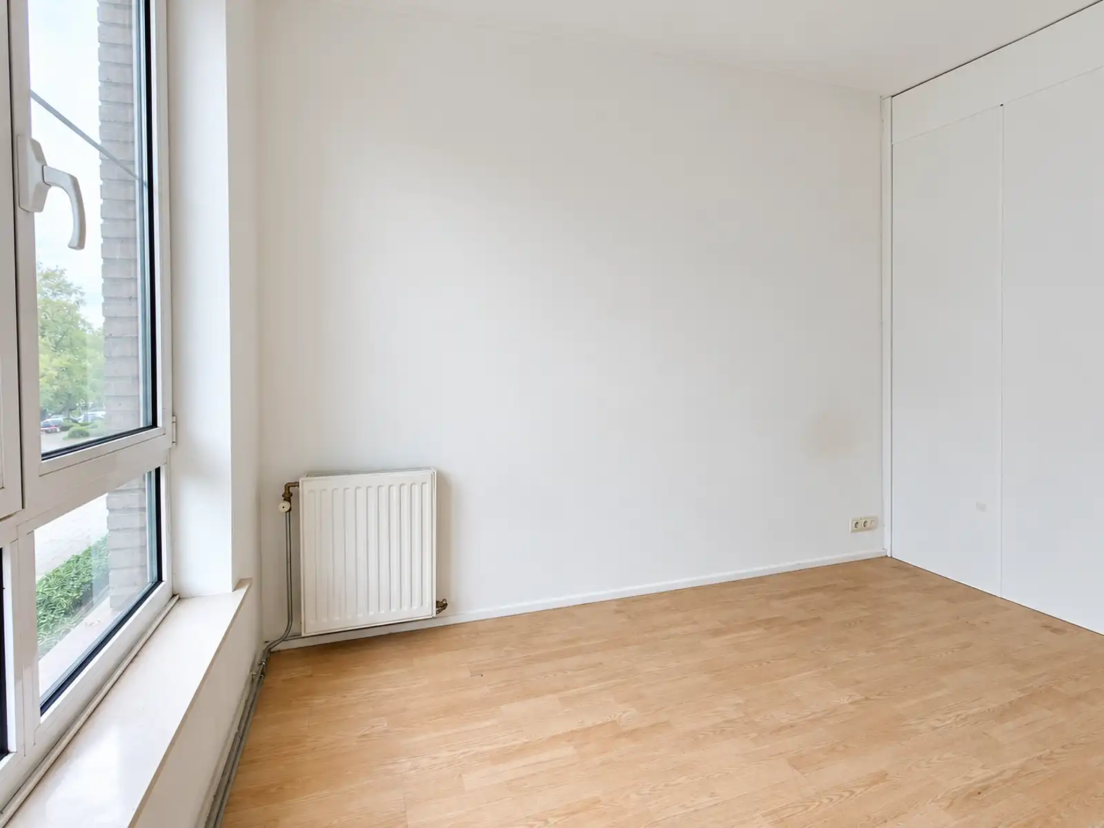 Licht 2 slaapkamer appartement met terras tegenover park! foto 7
