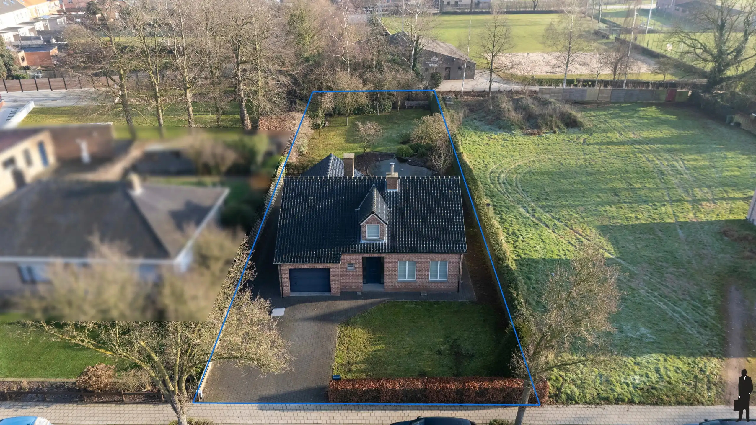 Vrijstaande woning op een ruim perceel van ca. 1.300 m² in hartje Loenhout! foto 32