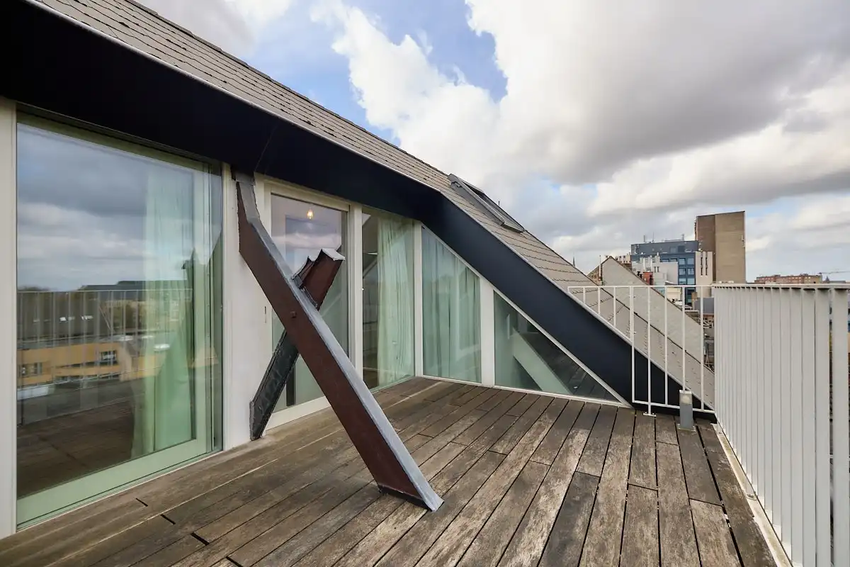 Exceptioneel en luxueus gerenoveerd 19e eeuws duplex dakappartement midden in de binnenstad. foto 11