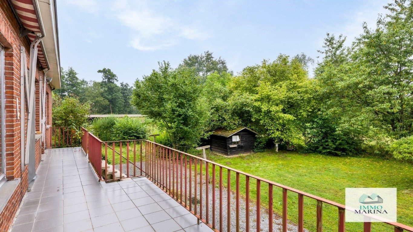 Woning met W-tuin circa 41a en volledige kelder. foto 9