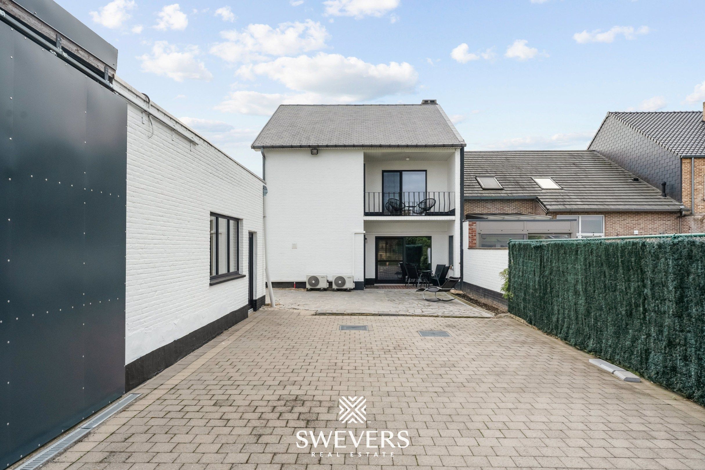 Volledig vernieuwd pareltje met terras, balkon & loods in Riemst foto 26