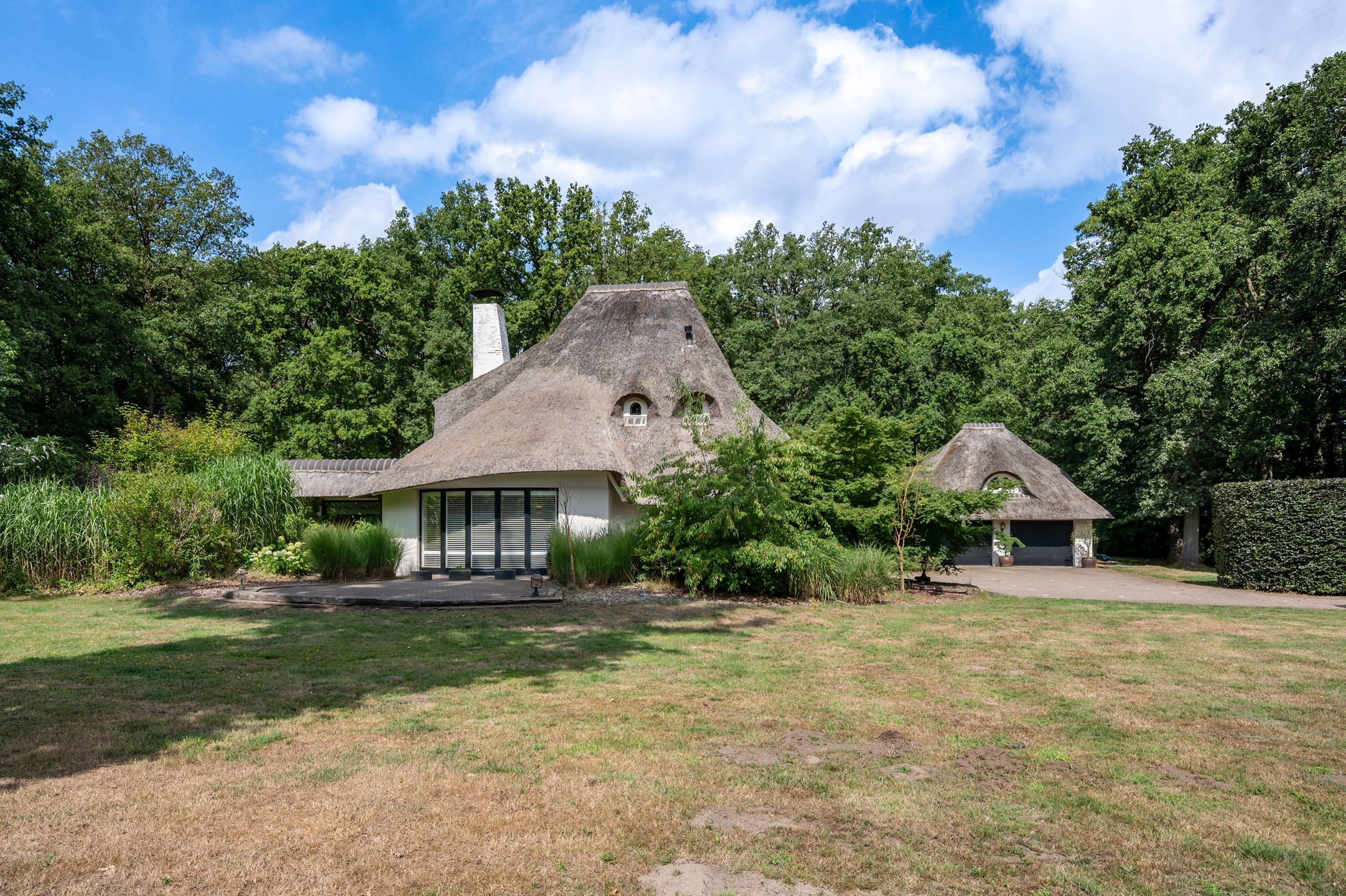 Charmante rietgedekte villa foto 50