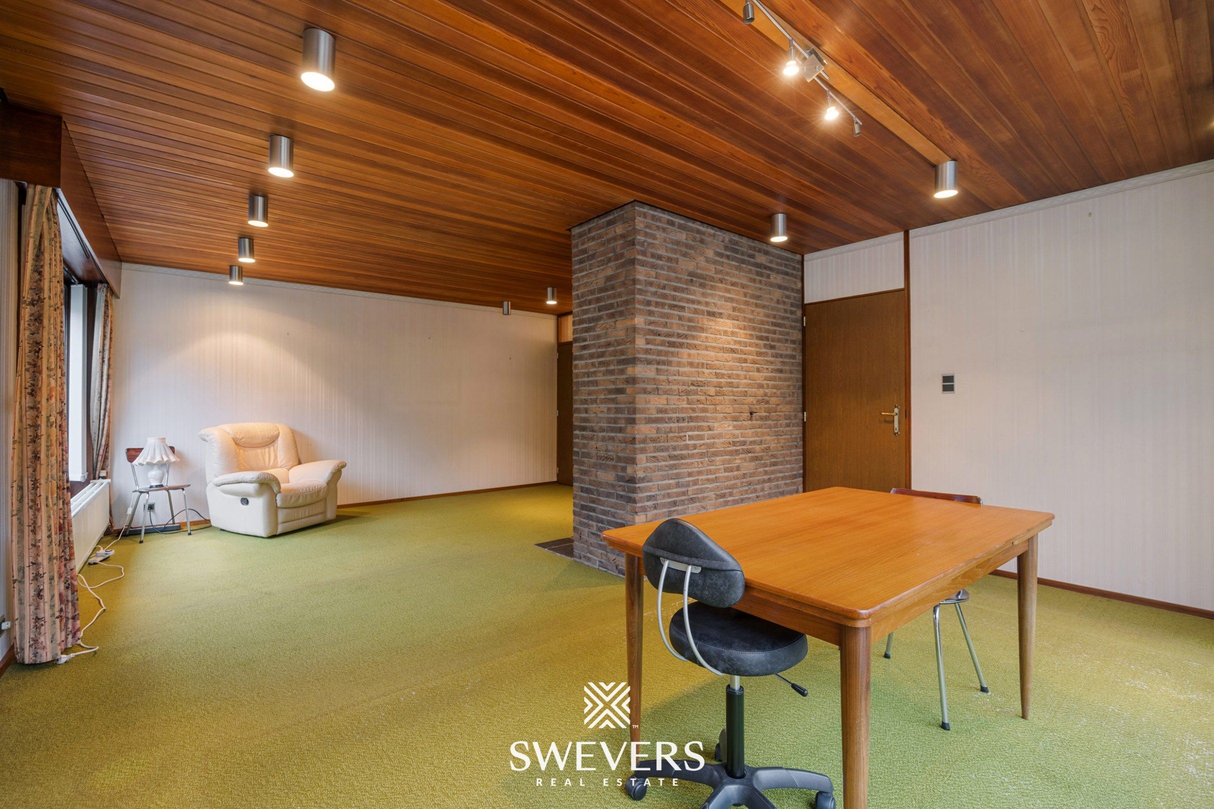 Vrijstaande woning met 329 m² wooncomfort, praktijkruimte en grote tuin foto 3