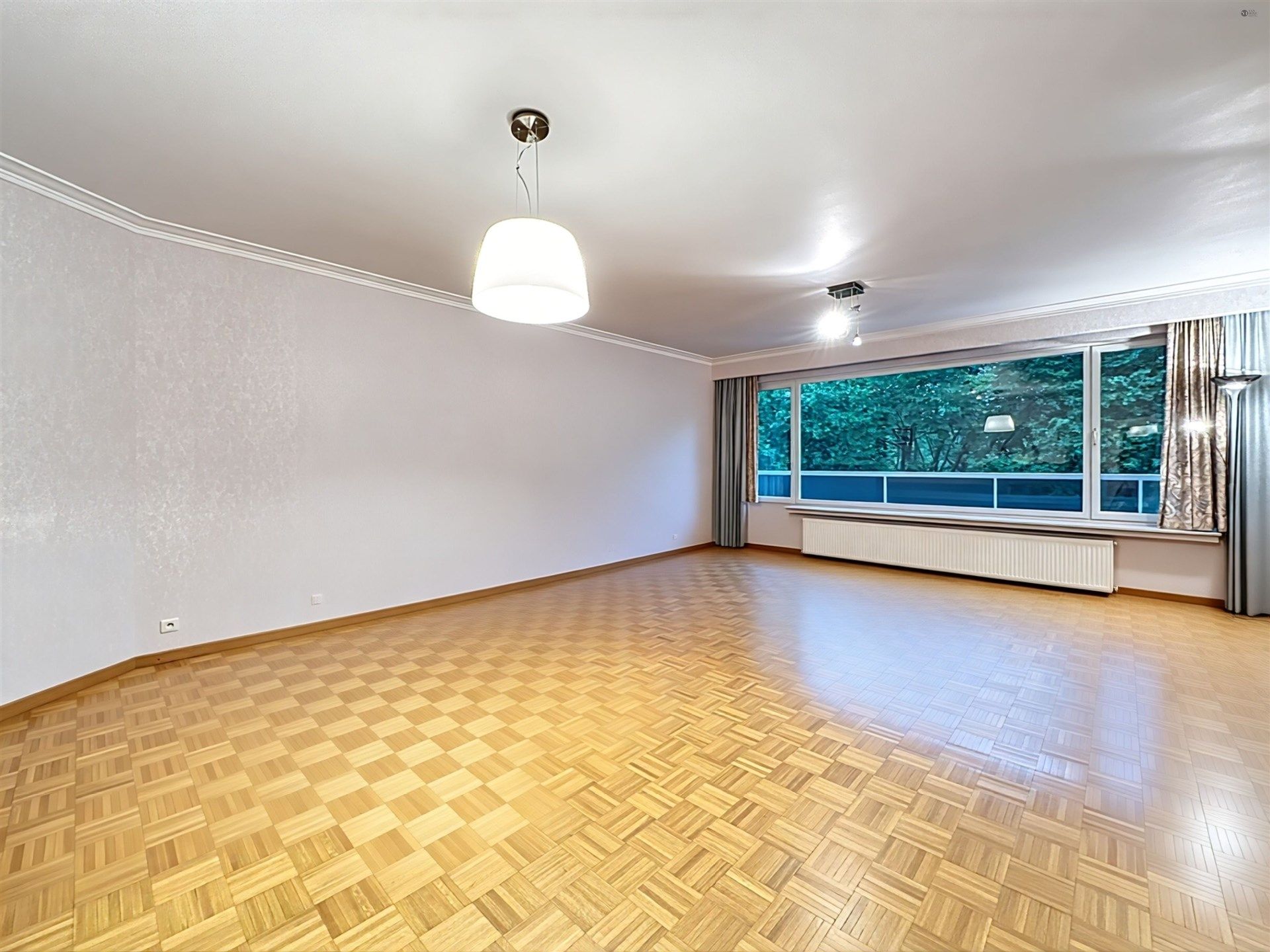Ruim en lichtrijk 3 slpk appartement met een fantastisch uitzicht foto 2