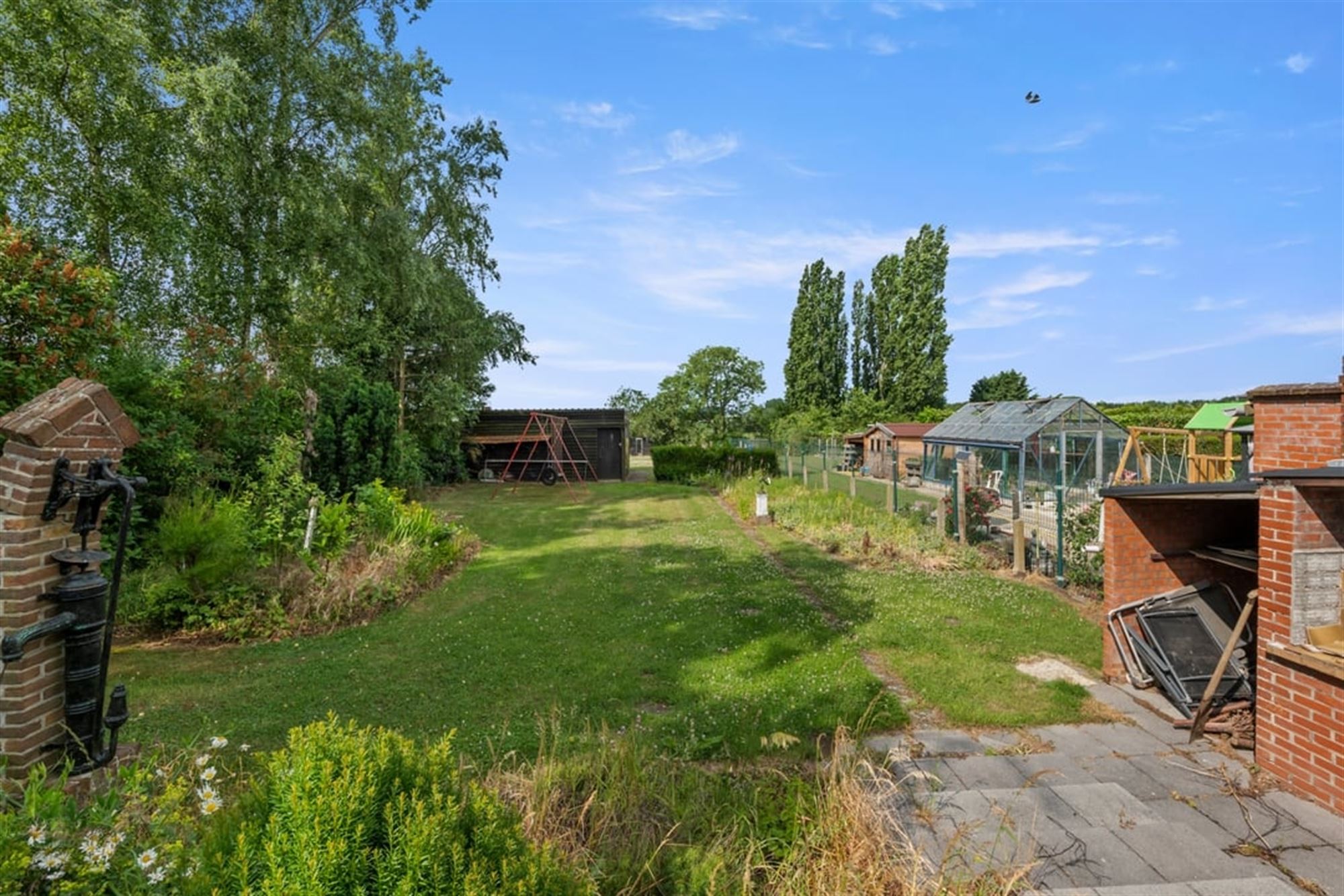 OP TE FRISSEN GELIJKVLOERSE GEZINSWONING OP EEN KNAP PERCEEL VAN 14A29CA IN WOMMERSOM foto 29