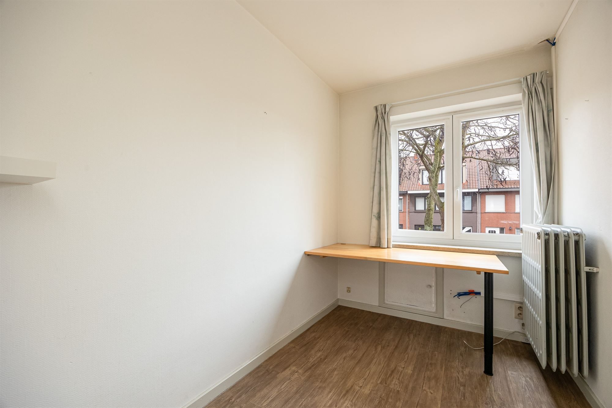 Op te frissen woning met 4-6 slpkmrs en Z-tuin foto 12