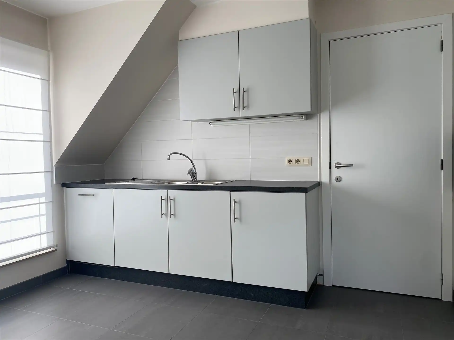 Gunstig gelegen dakappartement met autostaanplaats foto 7