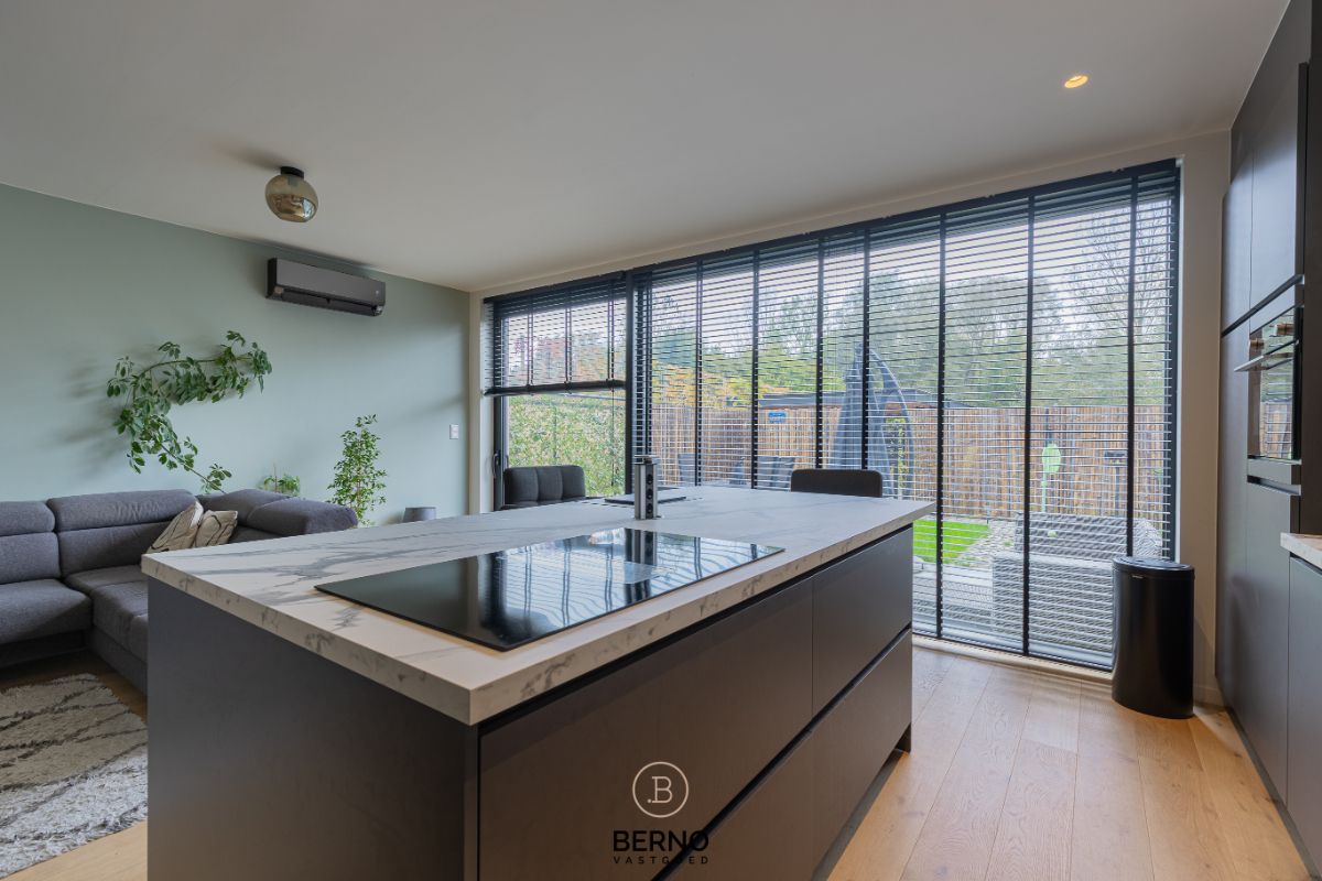 Recent gelijkvloers appartement met zonnig terras en tuintje in Opstal foto 7