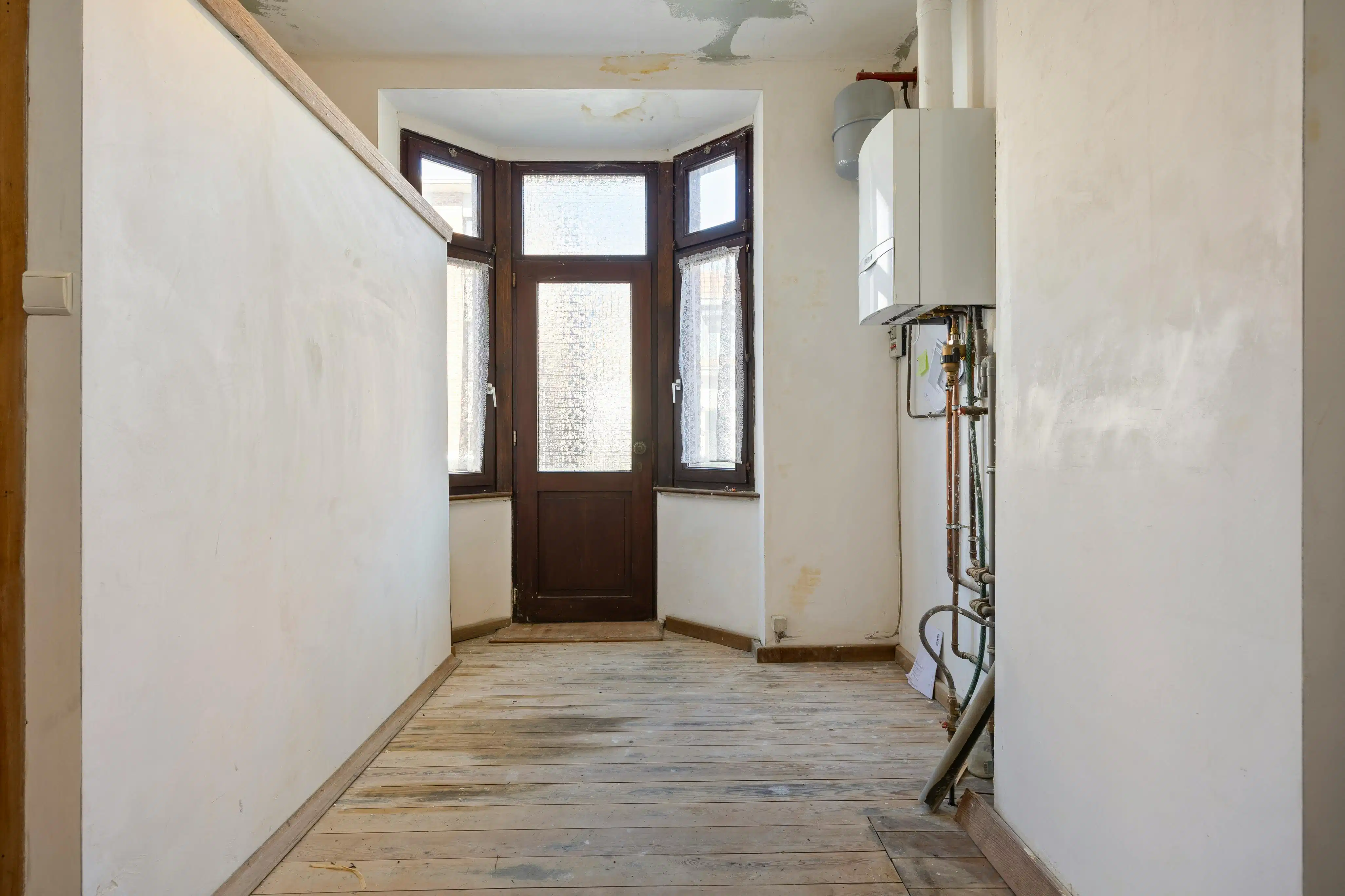 Charmant huis met veel potentieel te koop in Kapellen! foto 4