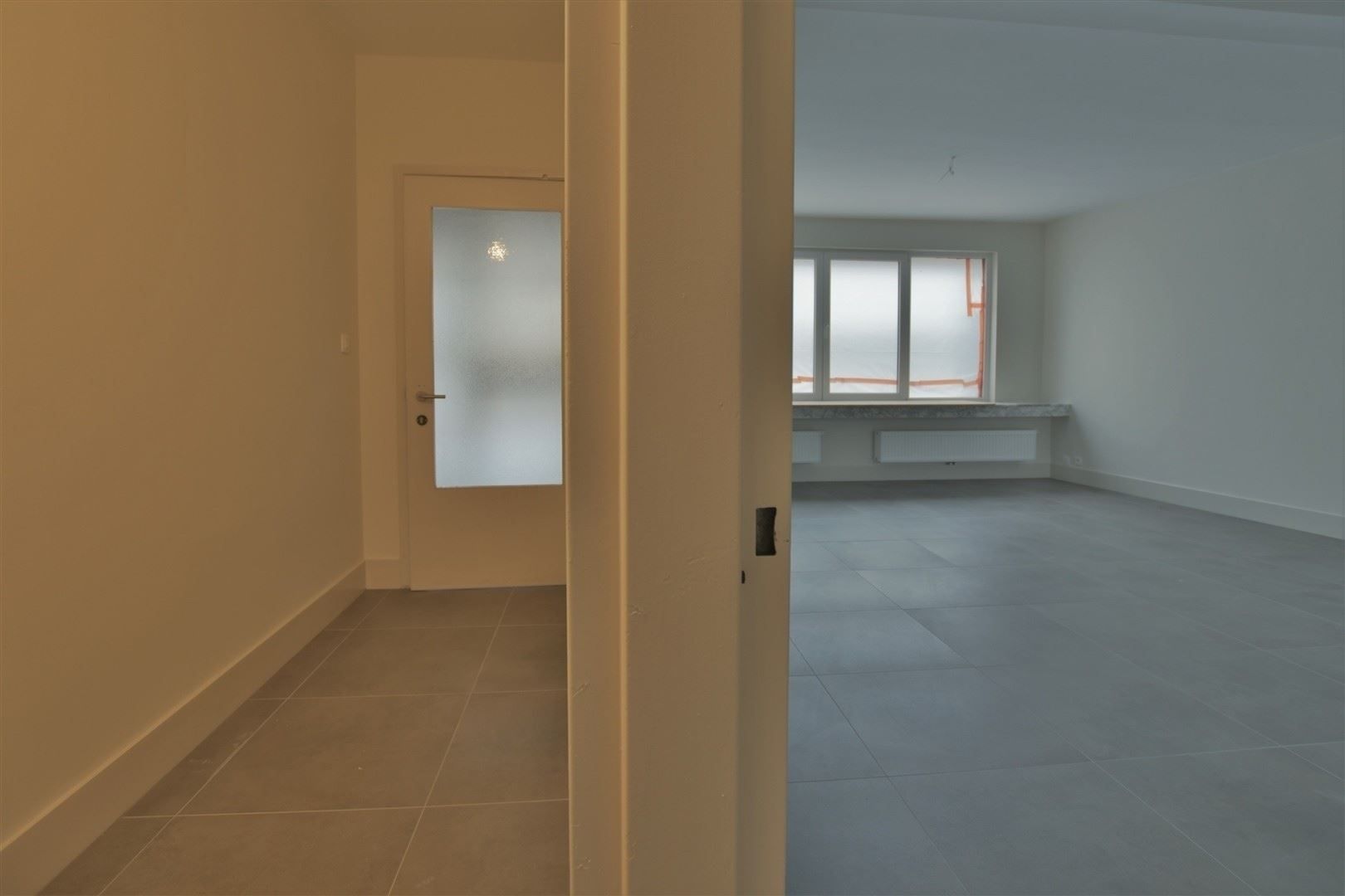 Totaal gerenoveerd GV appartement met tuin te Grembergen foto 23