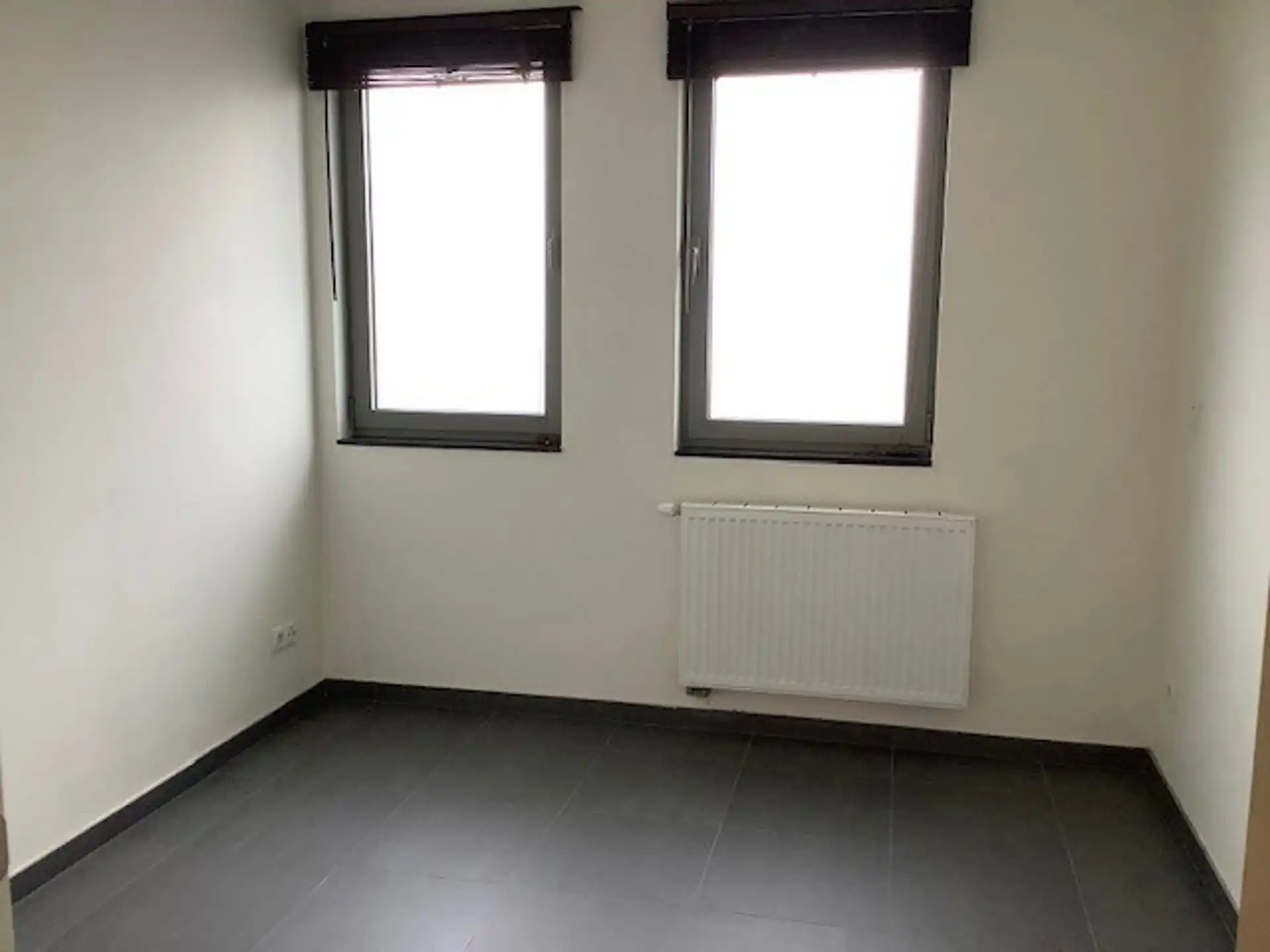LEDE - Ruim, gelijkvloers appartement mét staanplaats. foto 6