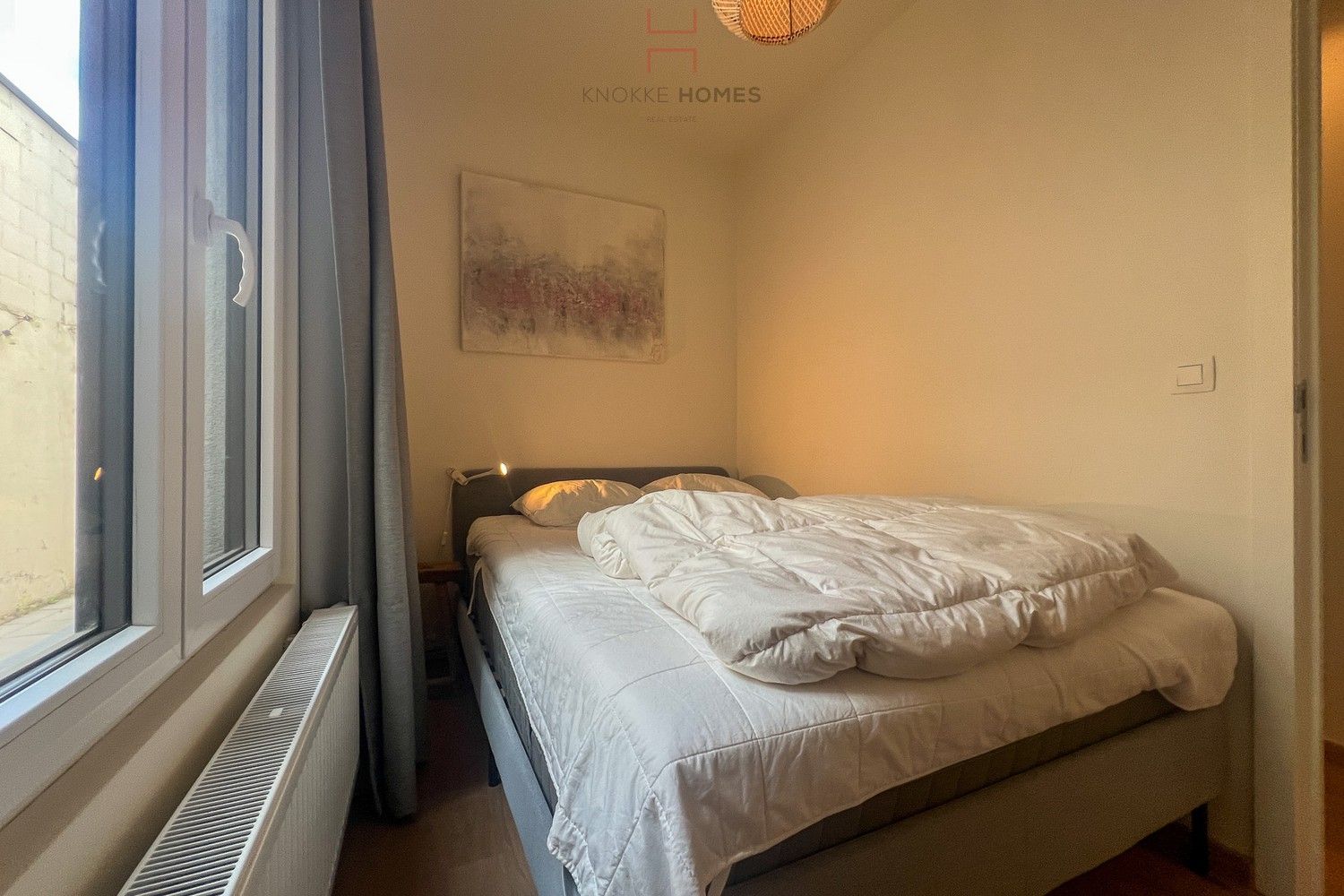 Instapklaar gelijkvloersappartement met twee slaapkamers in het centrum van Knokke, gelegen aan het levendige Gemeenteplein foto 15