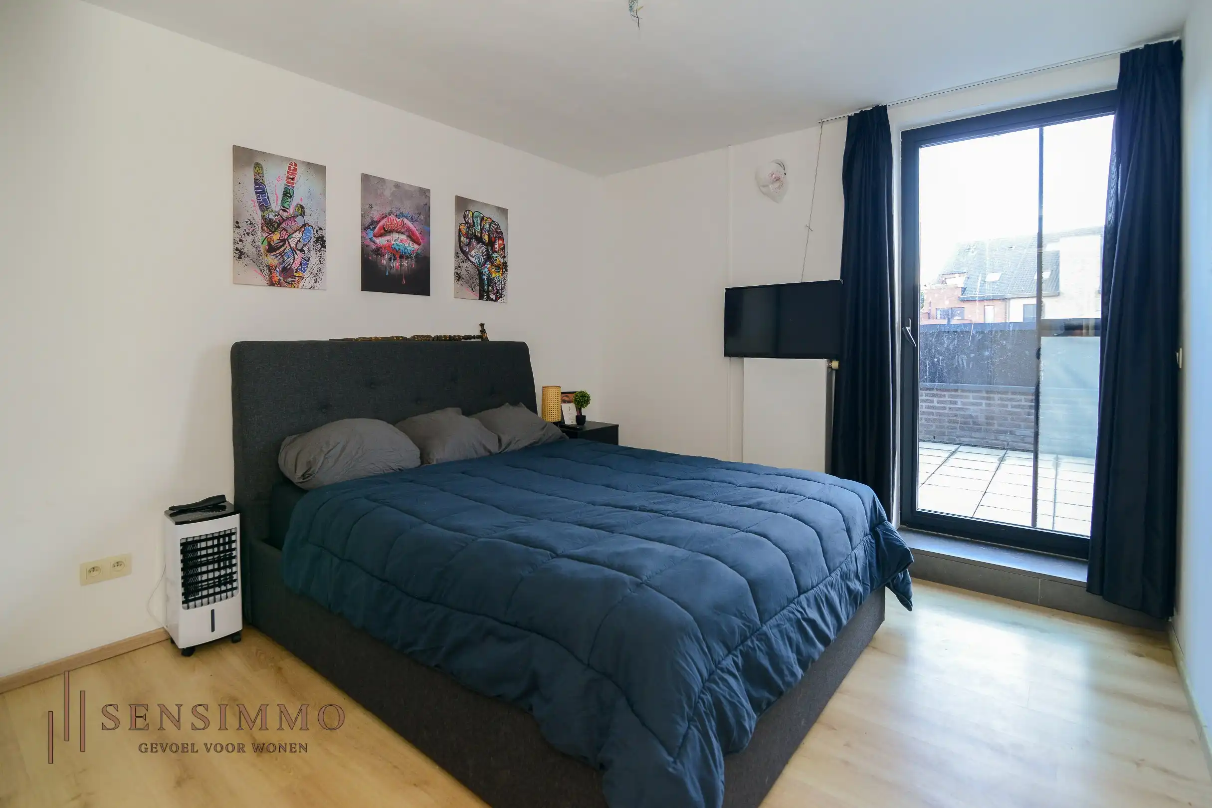 Instapklaar 2-slaapkamerappartement met dubbele terrassen en garagebox in hartje Eisden foto 10