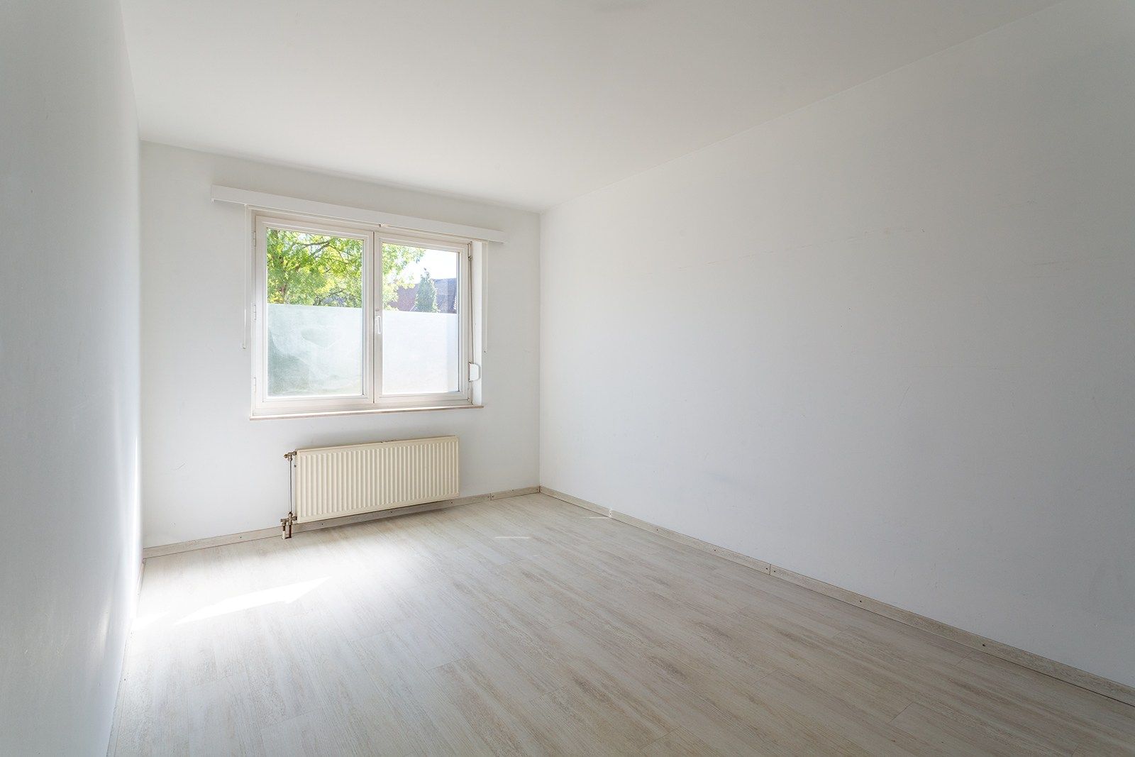 Mooi gelijkvloers appartement met tuin foto 15