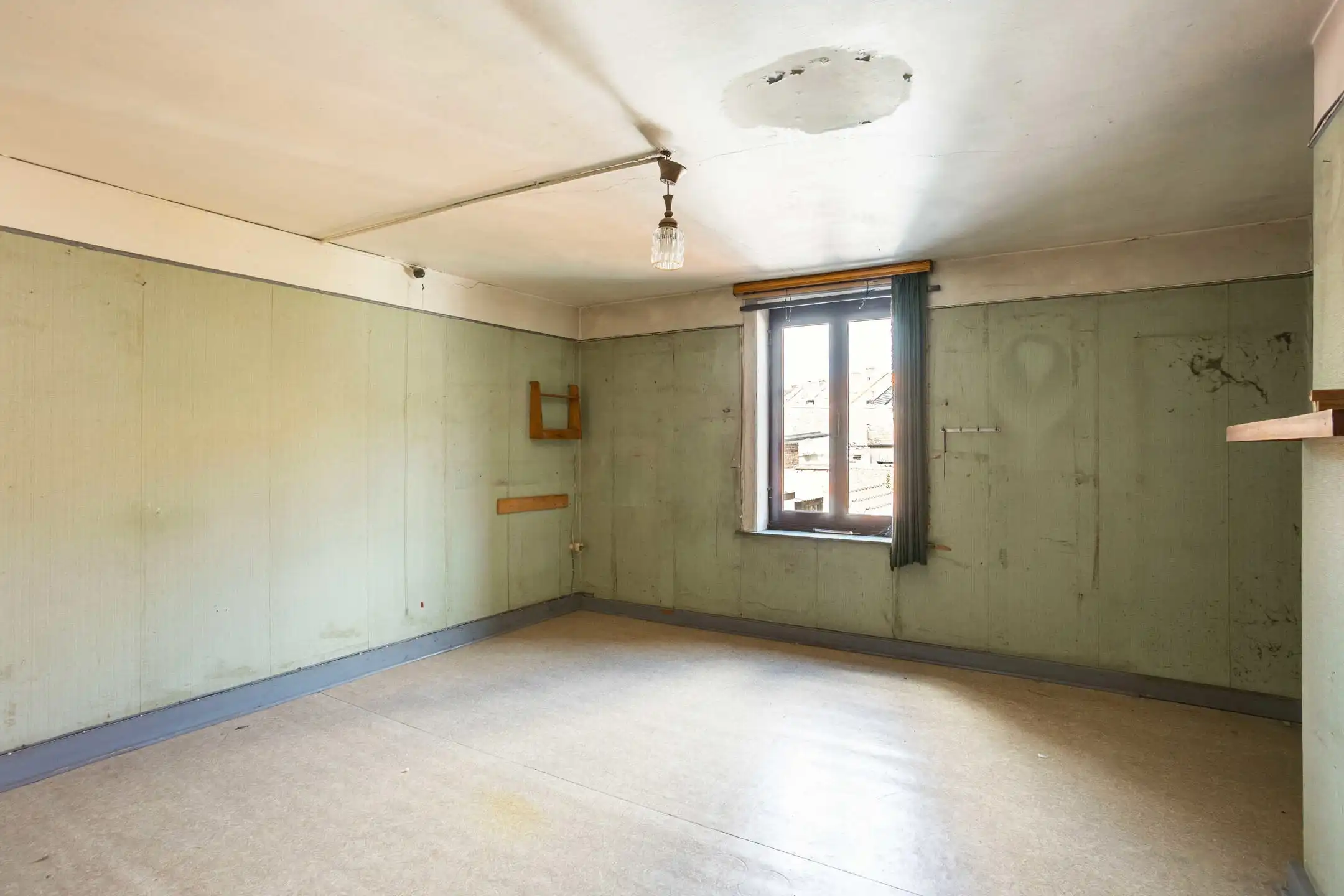 Te renoveren woning met tuin en tal van mogelijkheden foto 14