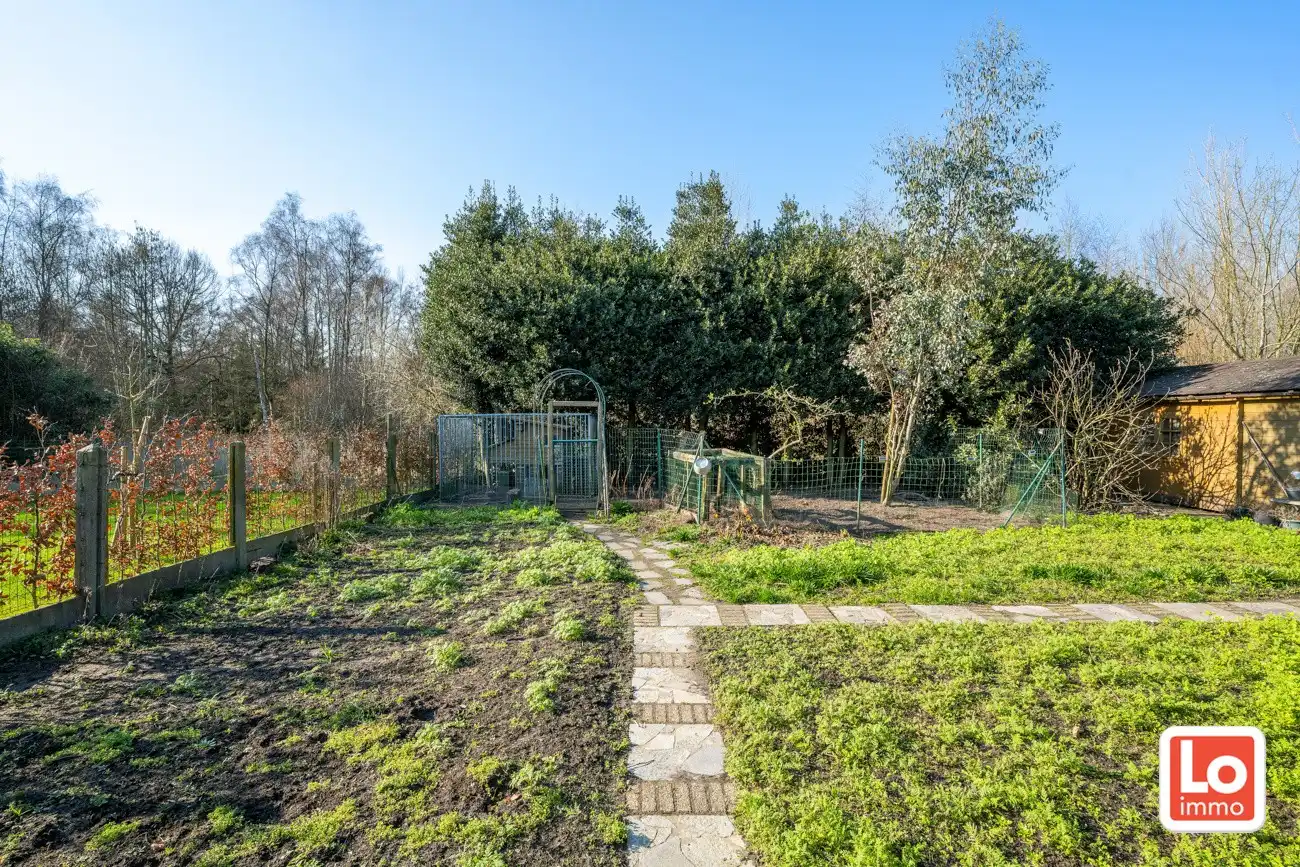 Degelijke open gelijkvloerse woning met inpandige garage en grote tuin op een groene toplocatie in Beervelde! foto 32