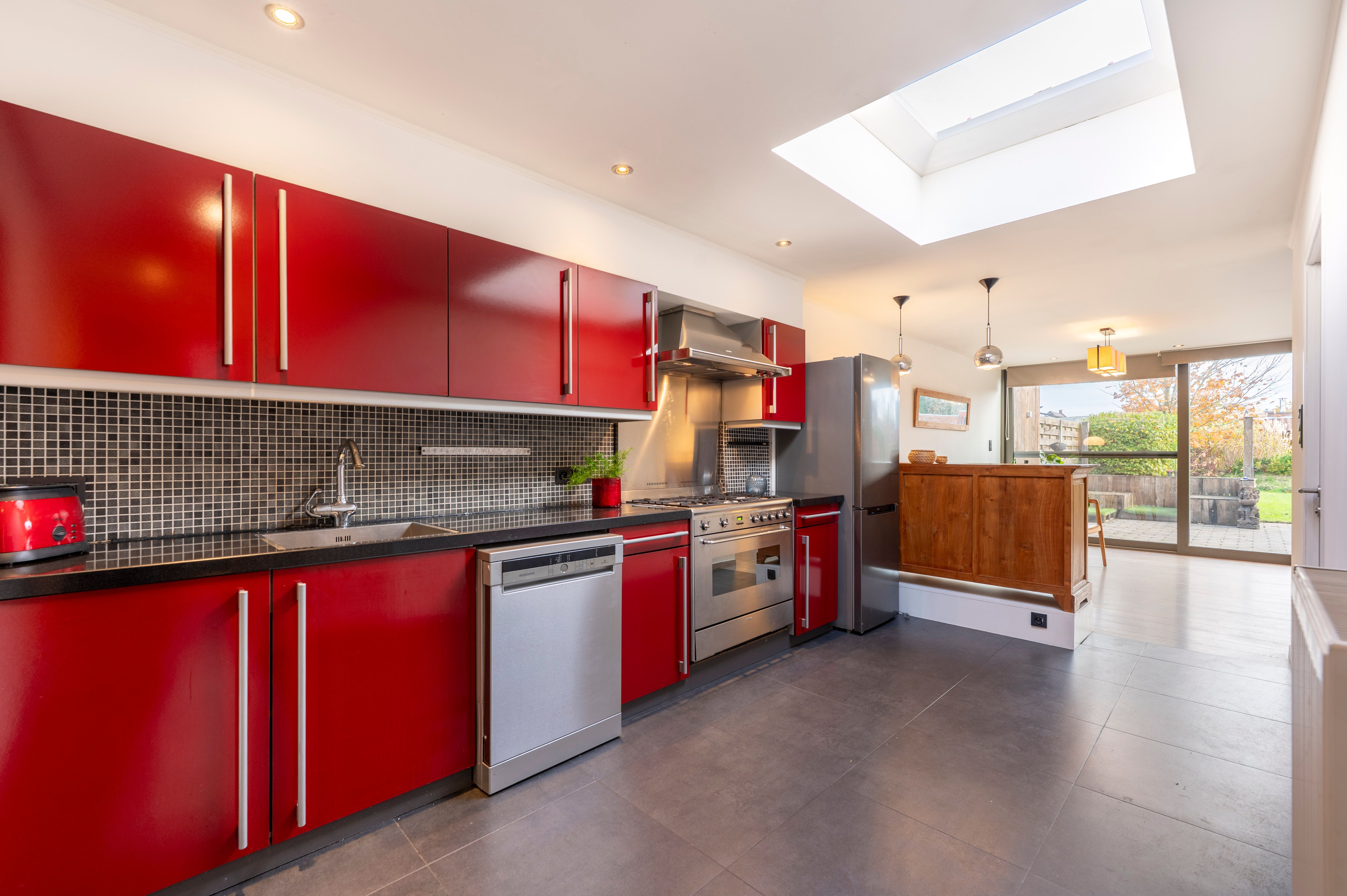 Verrassende woning met leuke tuin en grote garage nabij centrum Kapellen! foto 3