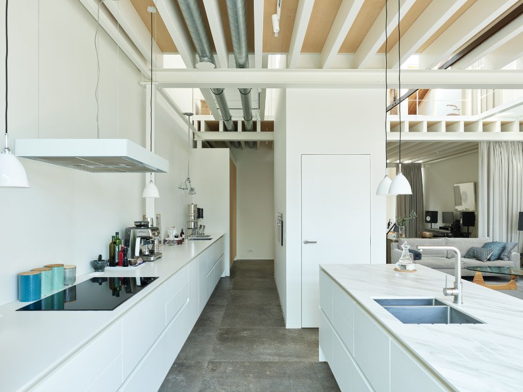 Luxueus en tijdloos – Exceptionele loft met 2 slaapkamers (mogelijkheid tot 3), ontworpen door ‘Plano Architecten’, in een beschermd gebouw met een rijkelijke industriële voorgeschiedenis. foto 9