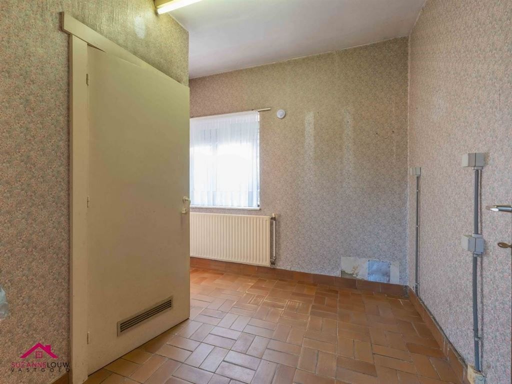 Te renoveren, vrijstaande woning op ruim perceel foto 27