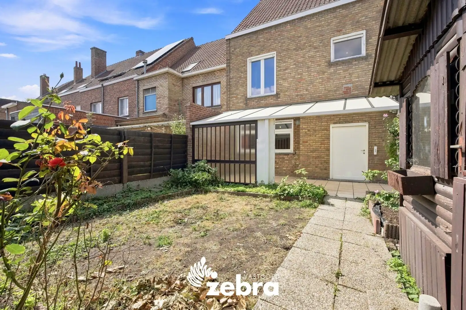 Halfopen bebouwing met drie slaapkamers, ruime zolder en garage in Brugge! foto 30