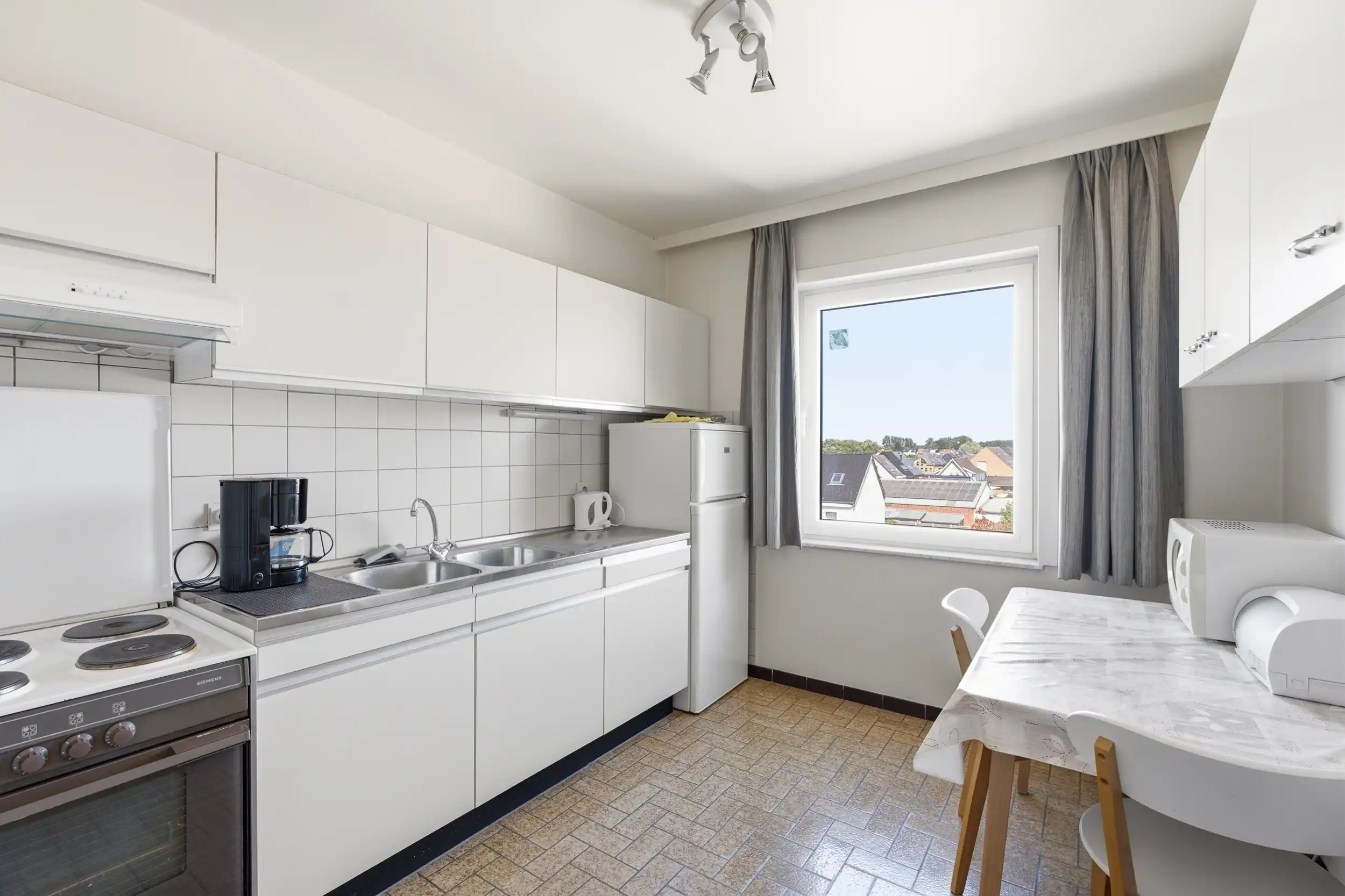 Lichtrijk 2-slaapkamerappartement op 3de verdiep in Lebbeke foto 4