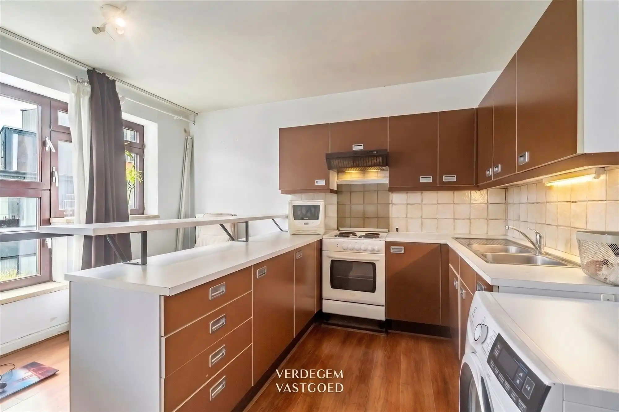 Leuk appartement op topligging met 2 slaapkamers, berging en terras foto 4