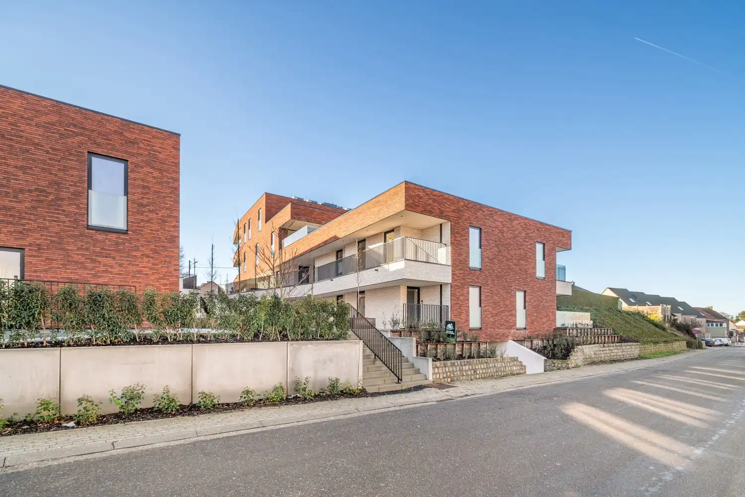 Luxe nieuwbouwappartementen en rijwoningen in het hart van Borgloon foto 2