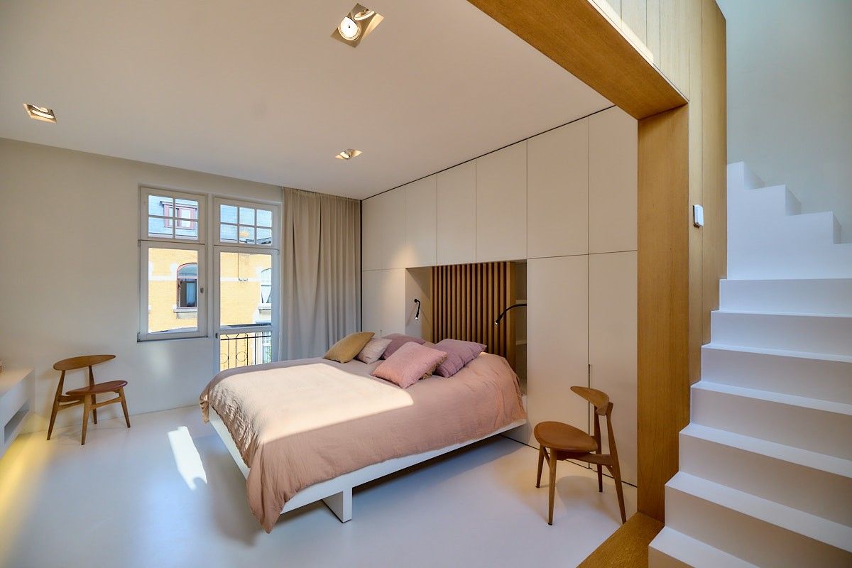 Buitengewone interbellum architecten-burgerwoning met tuin die omgevormd werd tot een hedendaagse luxueuze concept-woning. foto 35