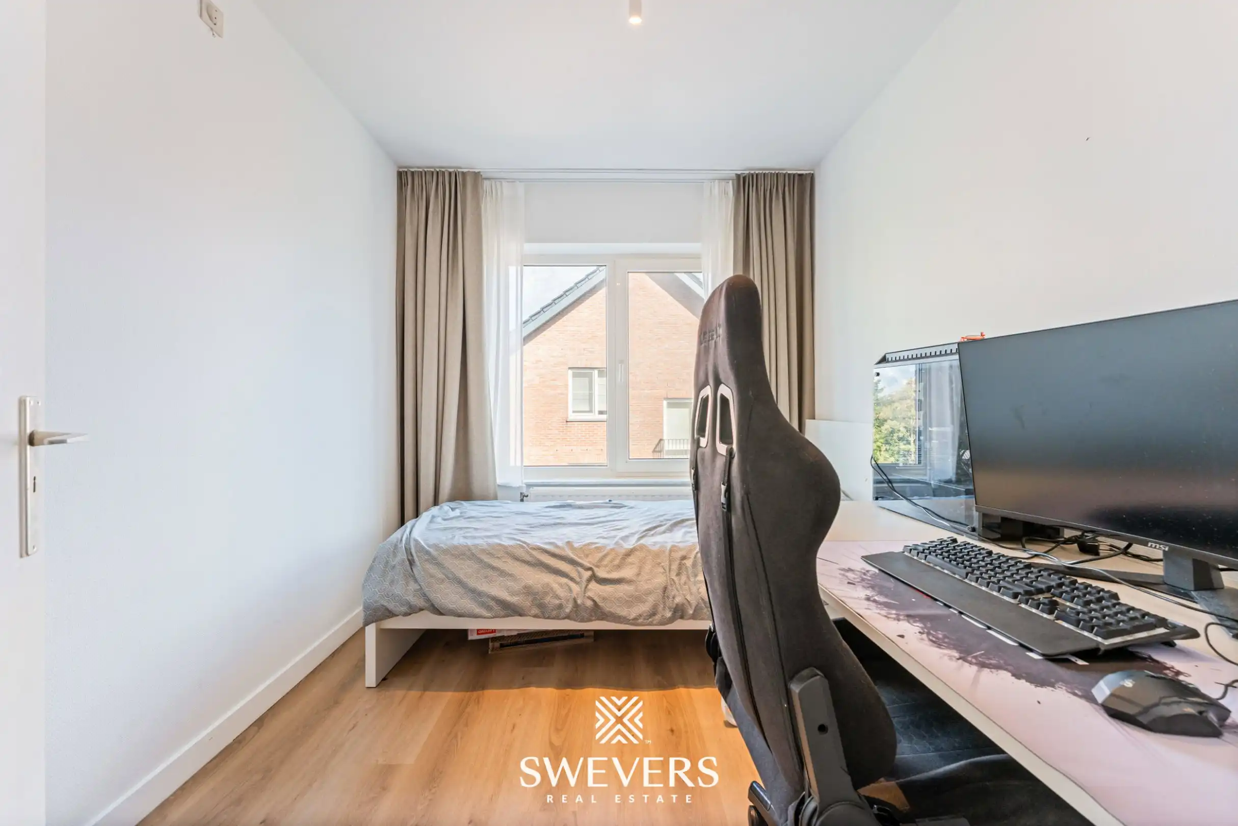 Instapklaar gelijkvloers 3-slaapkamerappartement met autostaanplaats en kelderberging nabij Hasselt-centrum foto 14