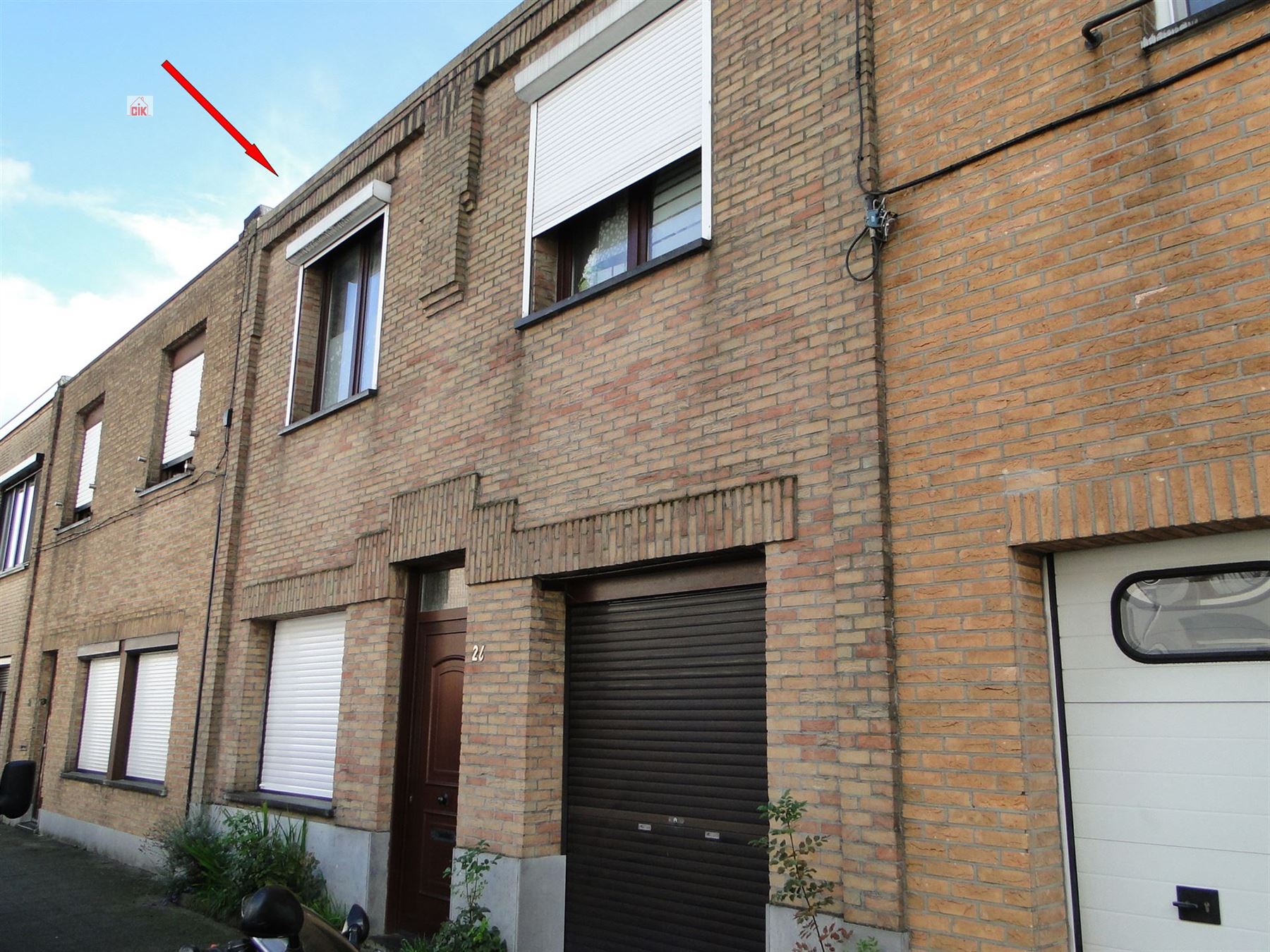 Woning met garage en koer foto 1