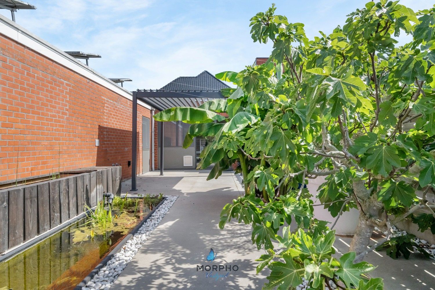 Hoofdfoto van de publicatie: Ruime en energiezuinige woning met wellness, 4 slpks en praktische stadstuin in hartje Veldegem