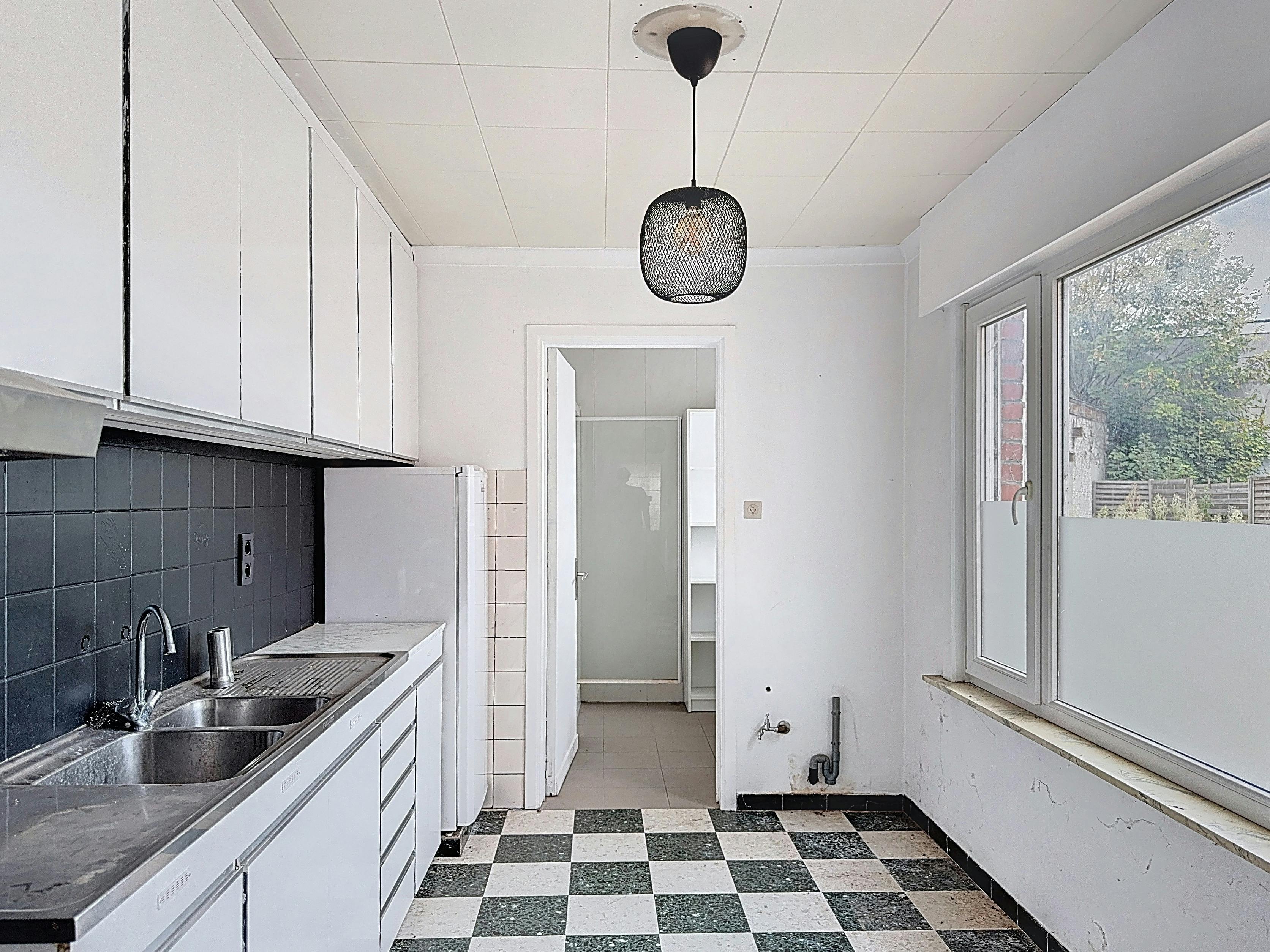 Te renoveren huis te koop in centrum Wielsbeke foto 6