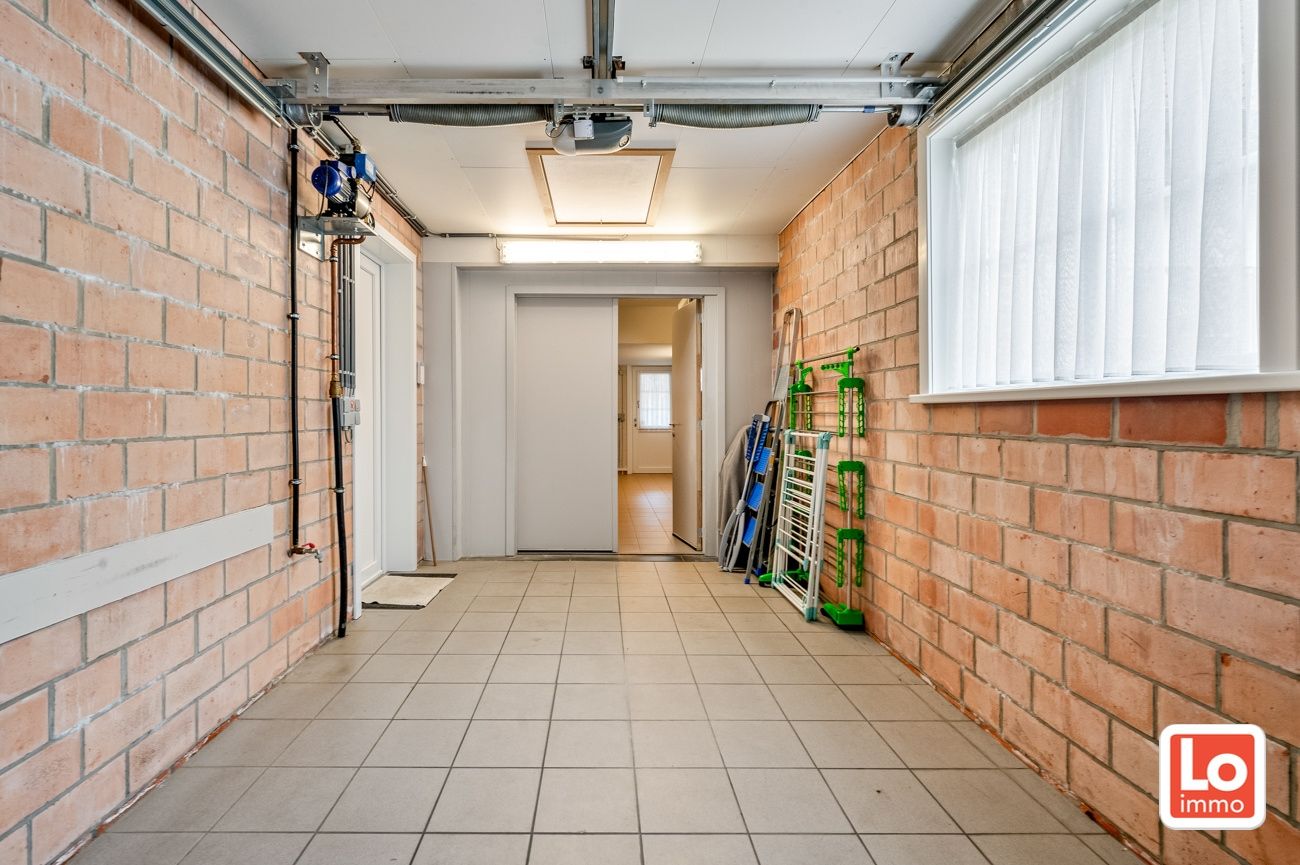 Charmante alleenstaande woning met inpandige garage op een zeer goede locatie in Oostakker. foto 6