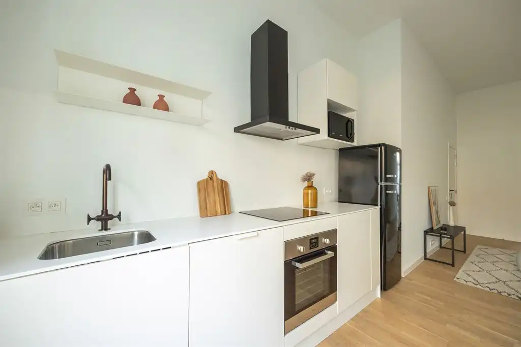 Gerenoveerd gelijkvloers appartement met stadstuin foto 3