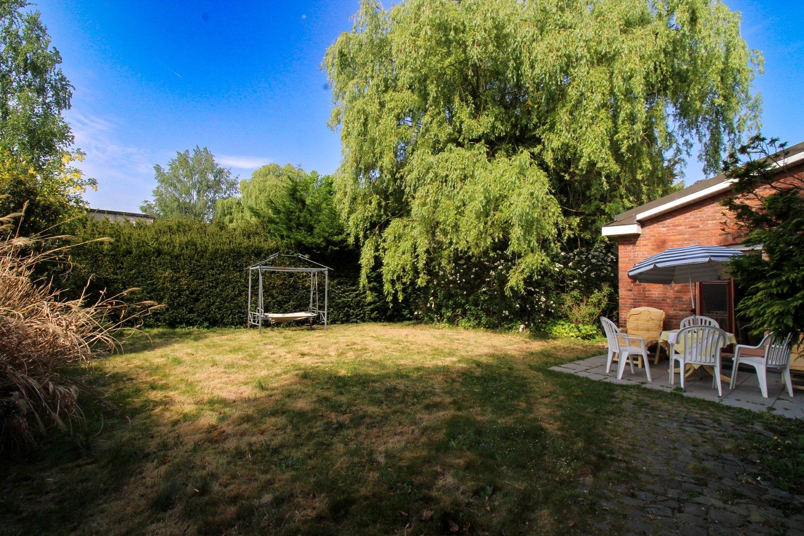 Luxe, ruimte en ontspanning onder één dak – exclusieve villa met zwembad en tennisveld te koop in Beveren! foto 41