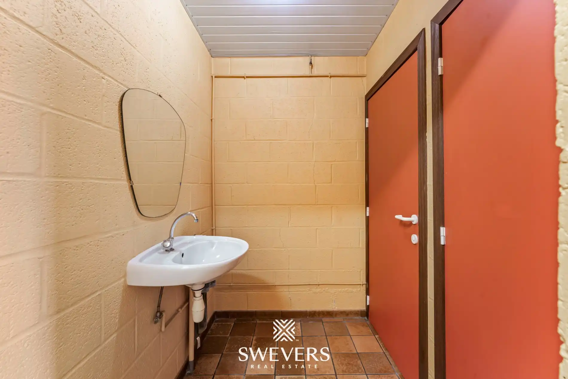 Instapklaar handelspand met woonst en tuin in Herk-de-Stad foto 9