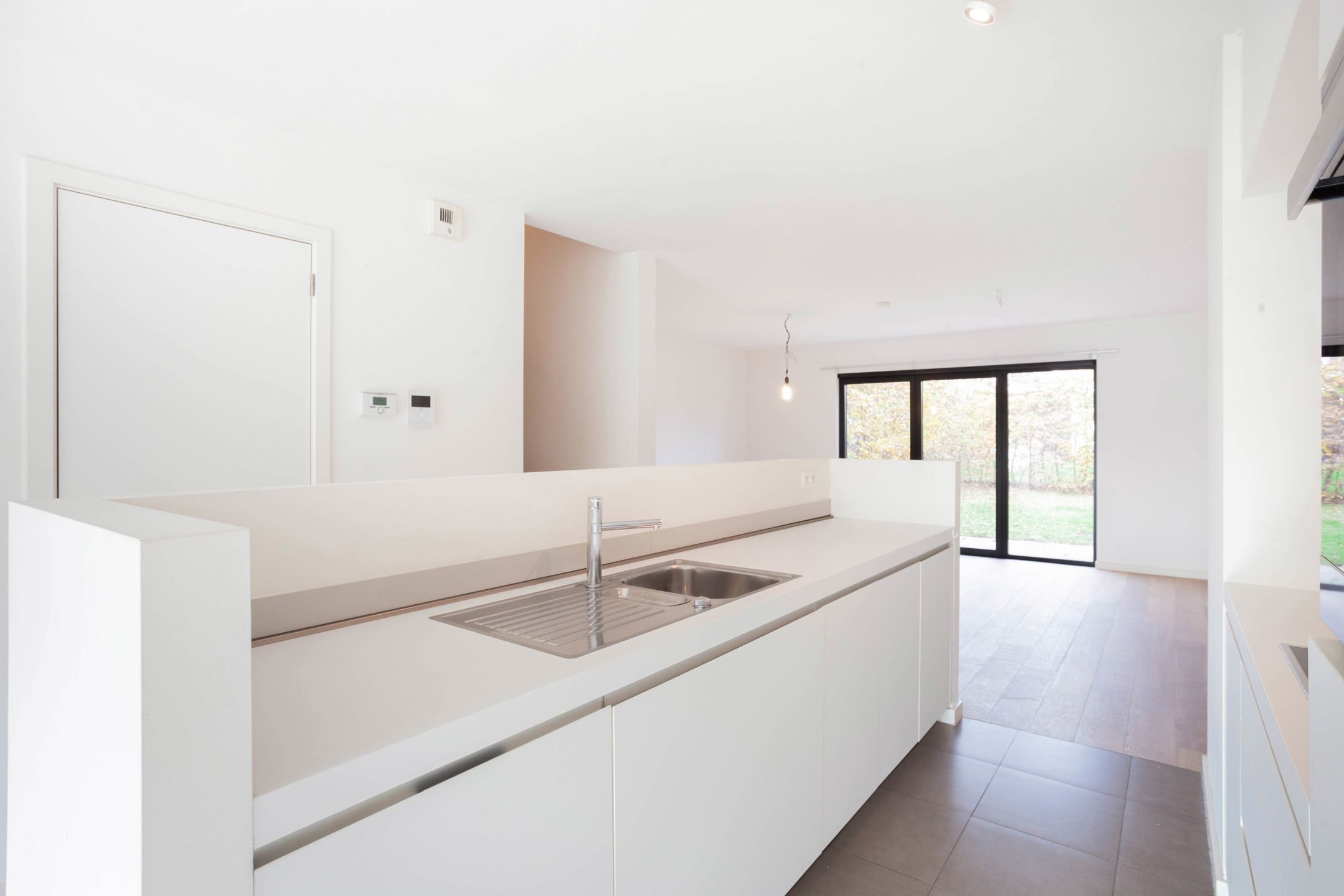 Recente woning met tuin, zonnig dakterras en staanplaats foto 7