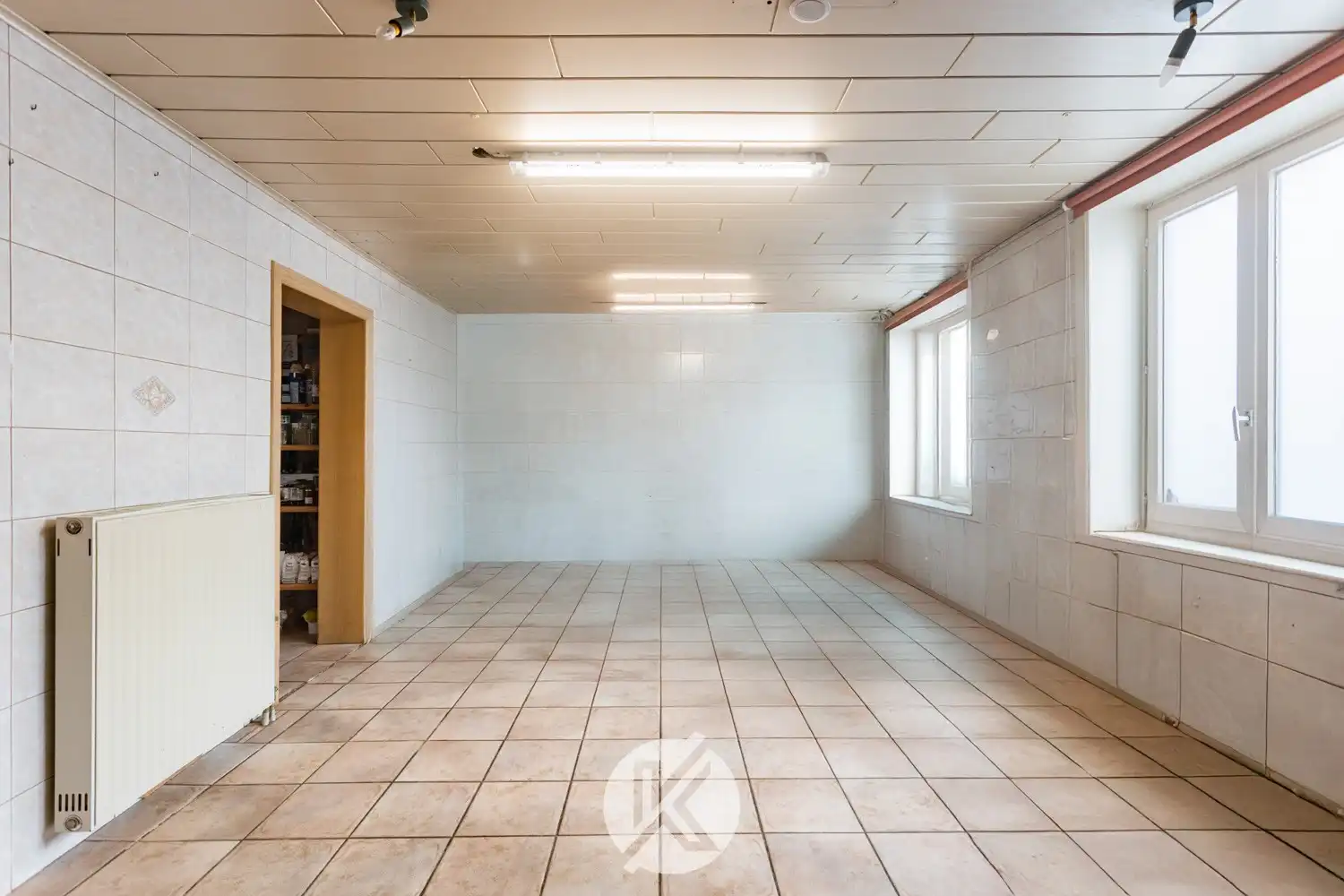 Ruime woning met veel potentieel in centrum Herzele foto 4