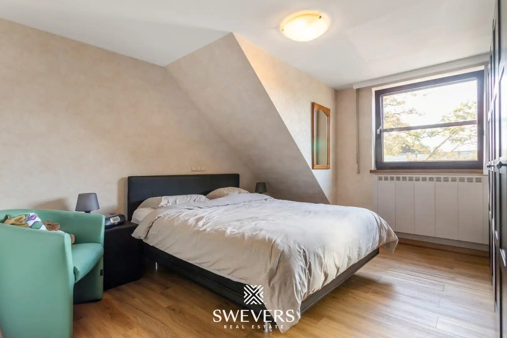 Ruim duplexappartement met grote veranda, riant terras, tuin en garage in hartje Lummen foto 10