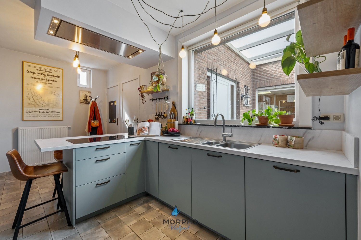 Charmante hoekwoning met karakter en historische uitstraling in hartje Ruddervoorde foto 9
