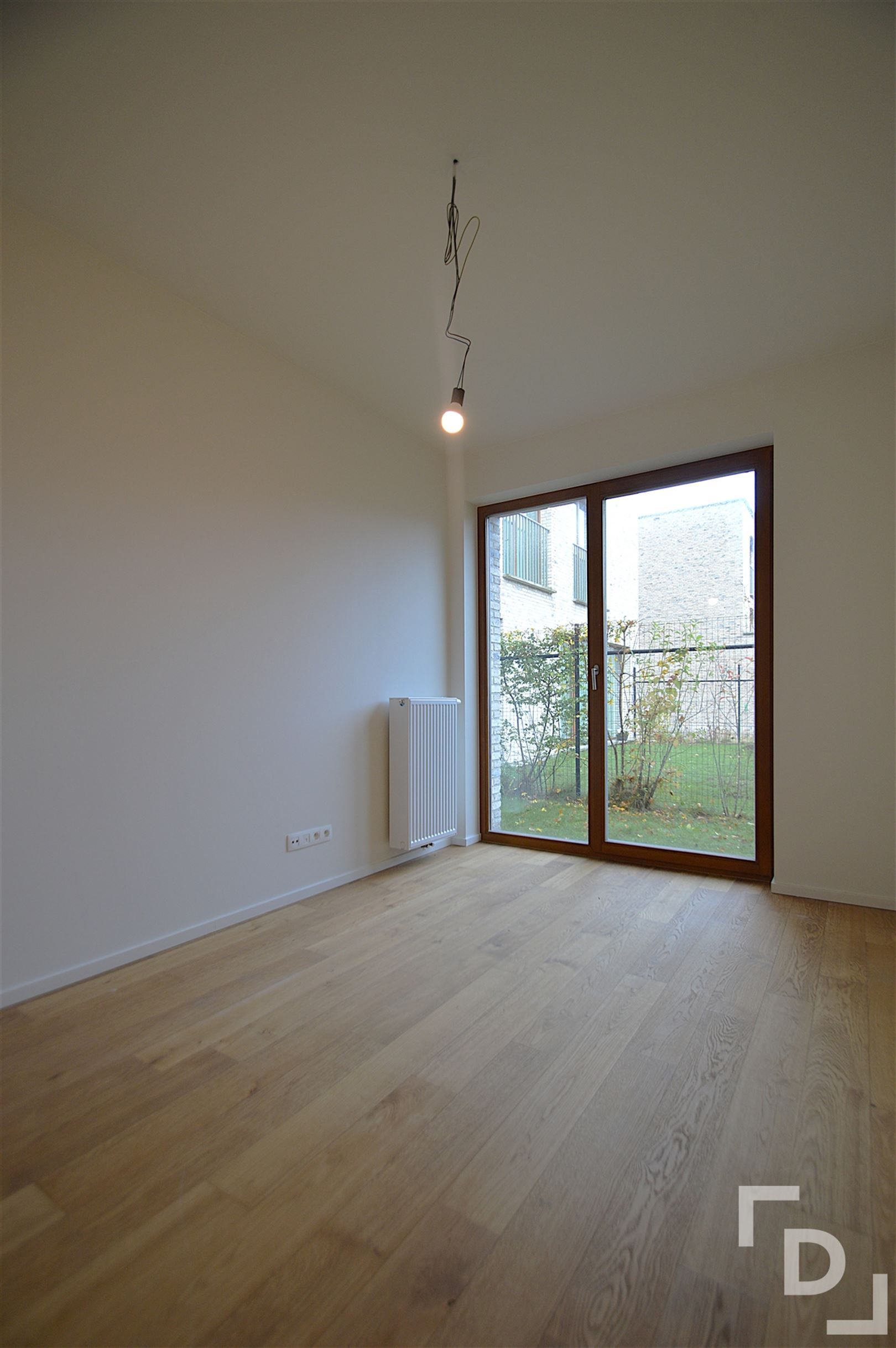 Gelijkvloers appartement met tuintje. foto 8