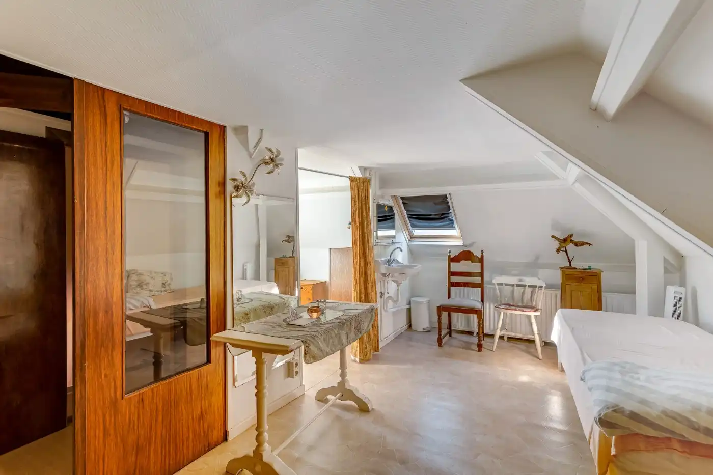 Te renoveren, geklasseerde art deco woning met 3 slpk, ruime zolder en Z-tuin foto 20