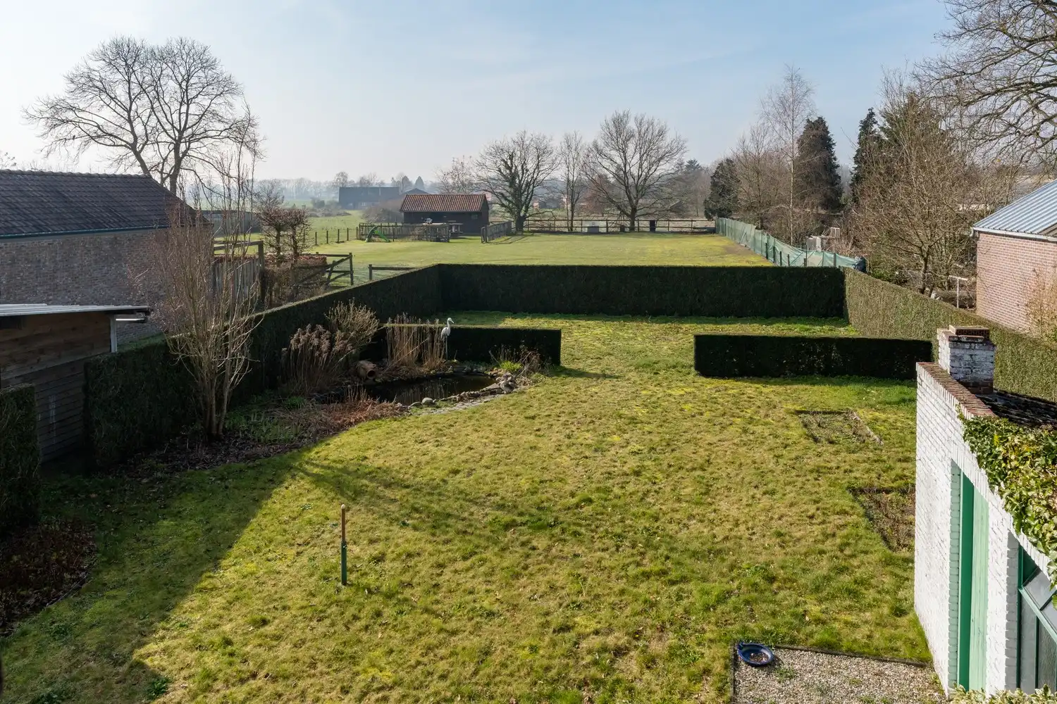 Ruime woning op toplocatie in Achel met prachtig perceel van 20a90 foto 2