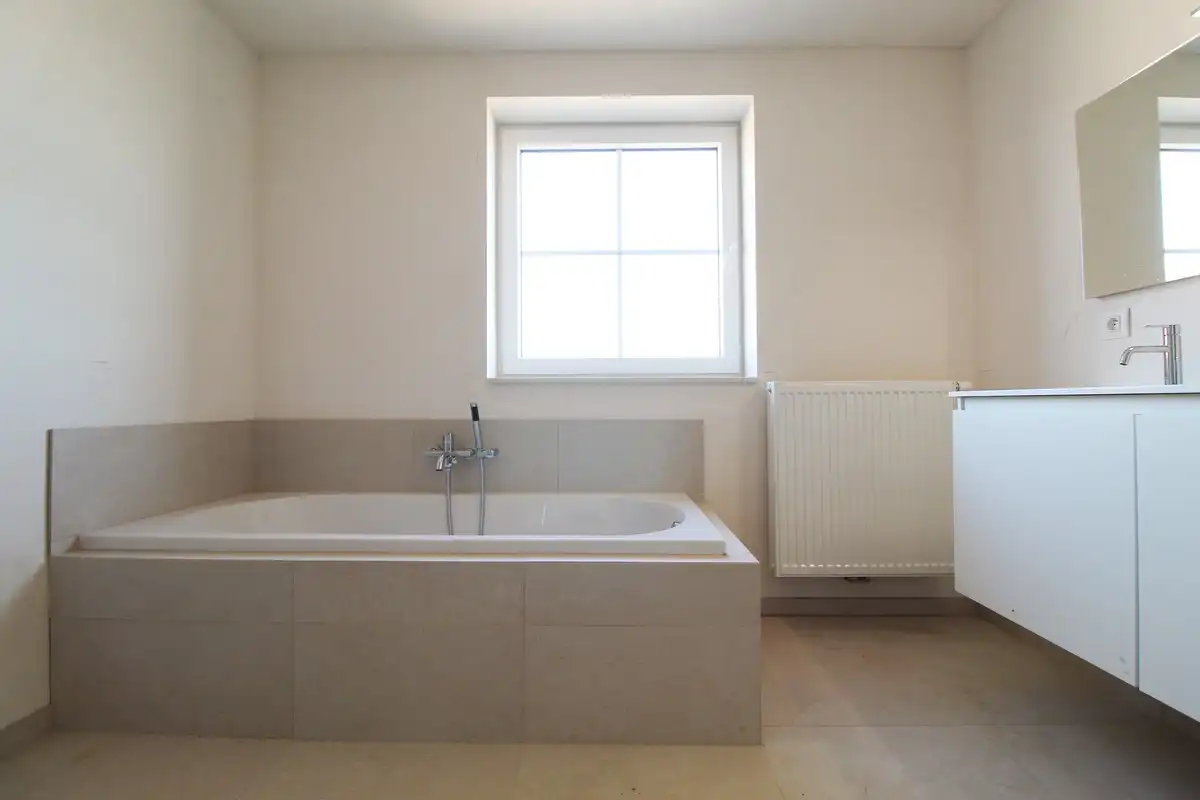 Halfopen nieuwbouwwoning met garage Roeselare foto 9